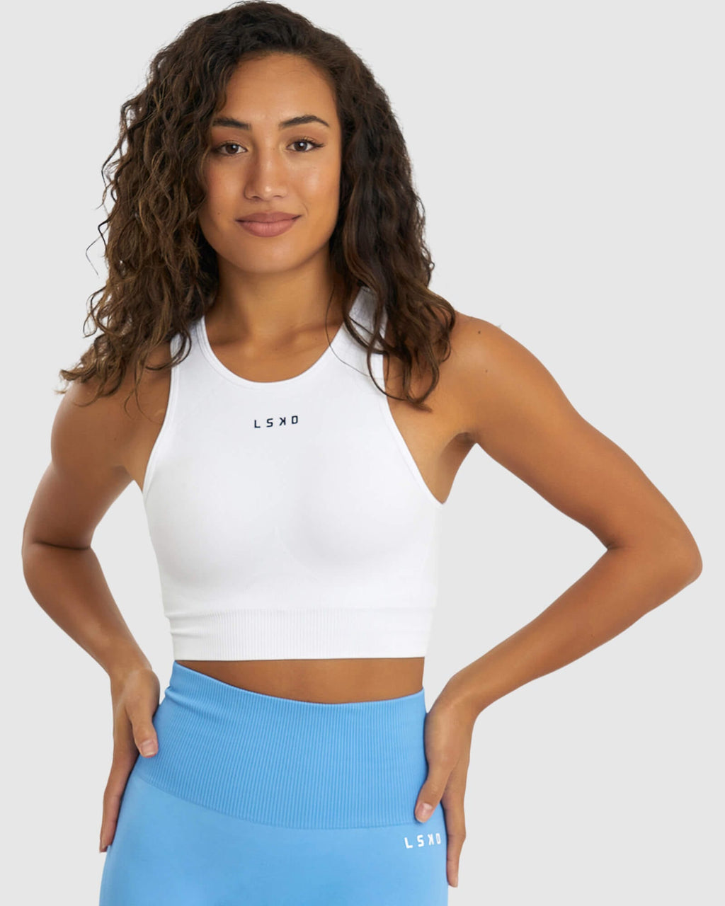 Model wearing Limitless Seamless Crop Top - White