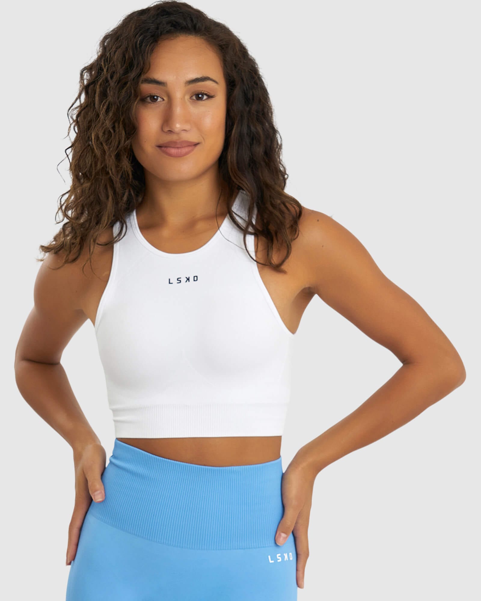 Model wearing Limitless Seamless Crop Top - White
