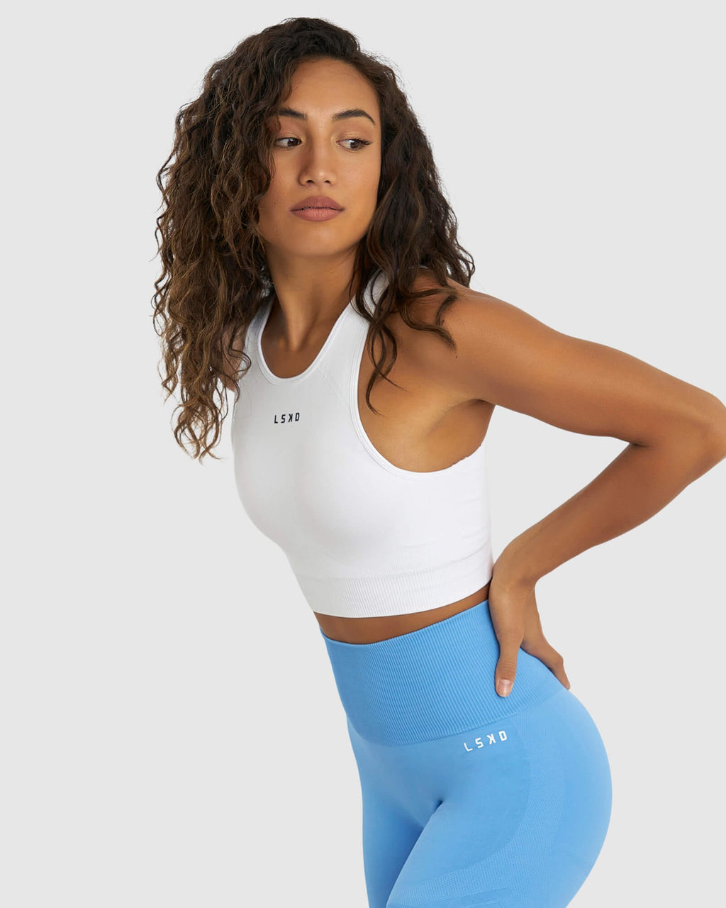 Model wearing Limitless Seamless Crop Top - White