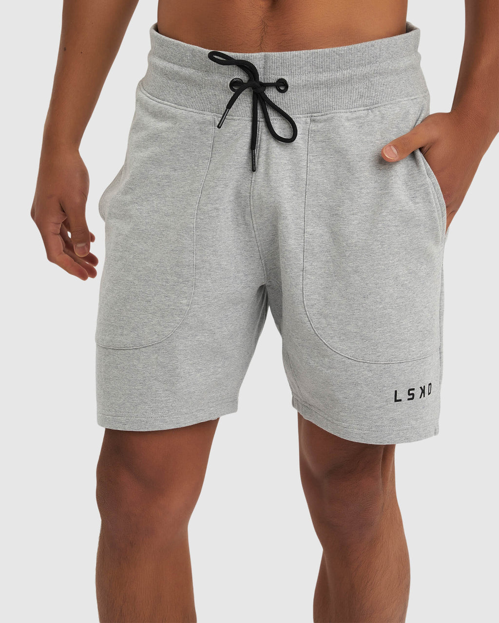 Model wearing Routine Track Short - Light Grey Marl