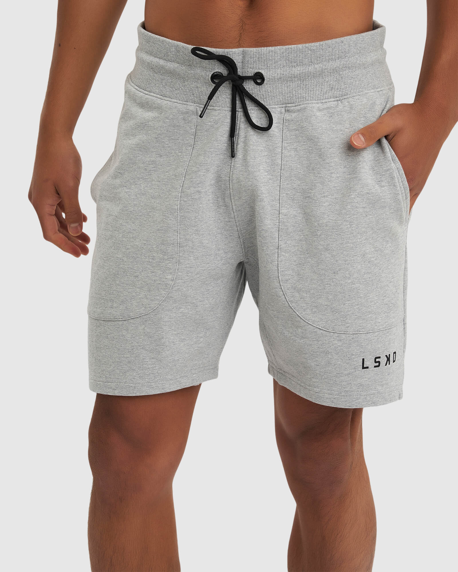 Model wearing Routine Track Short - Light Grey Marl