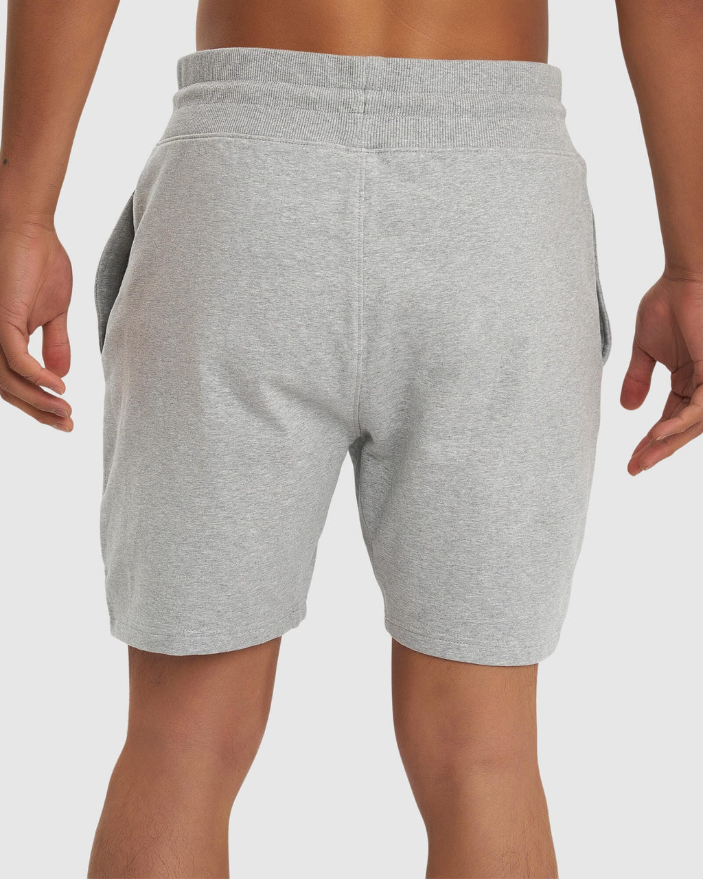 Model wearing Routine Track Short - Light Grey Marl
