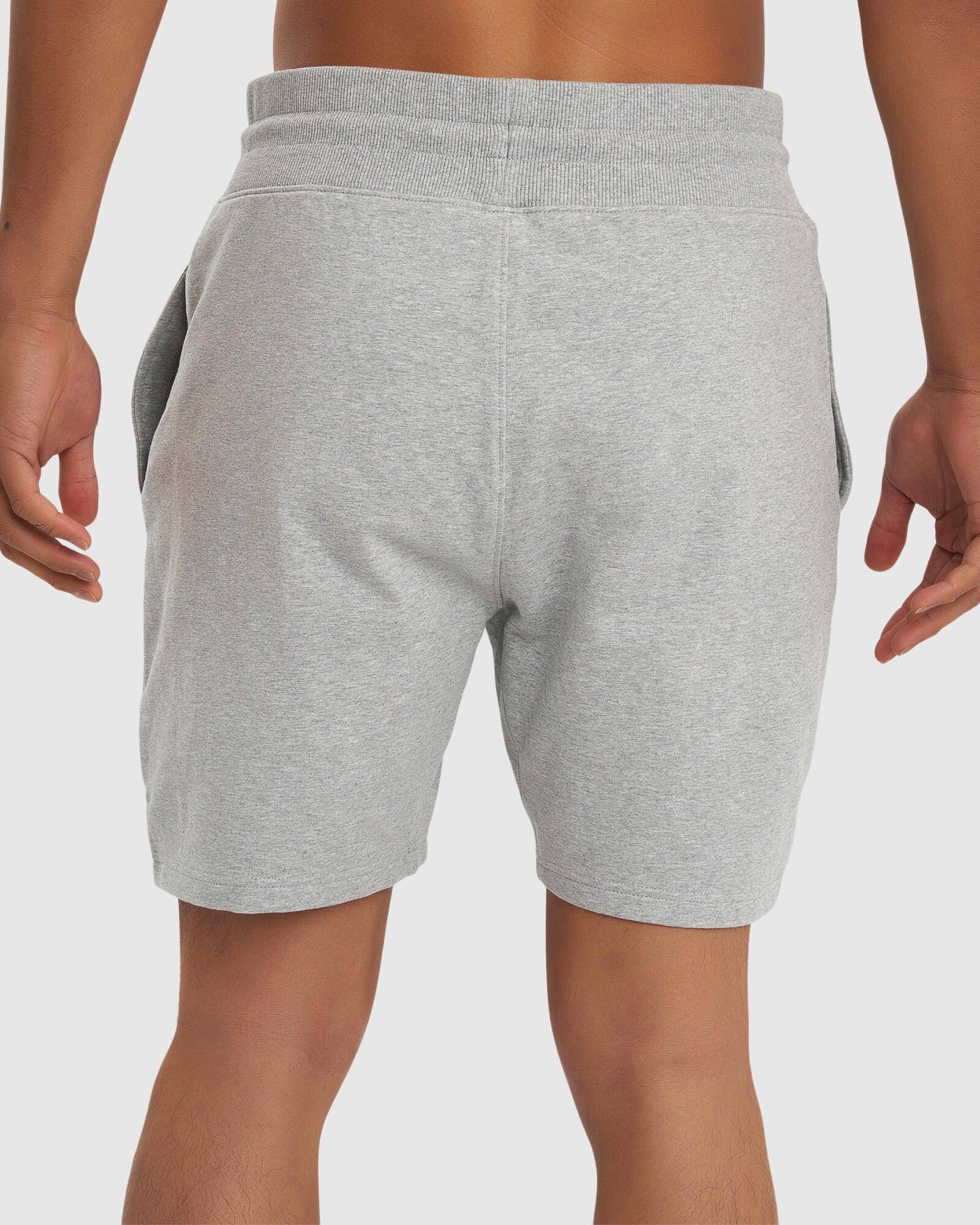 Model wearing Routine Track Short - Light Grey Marl