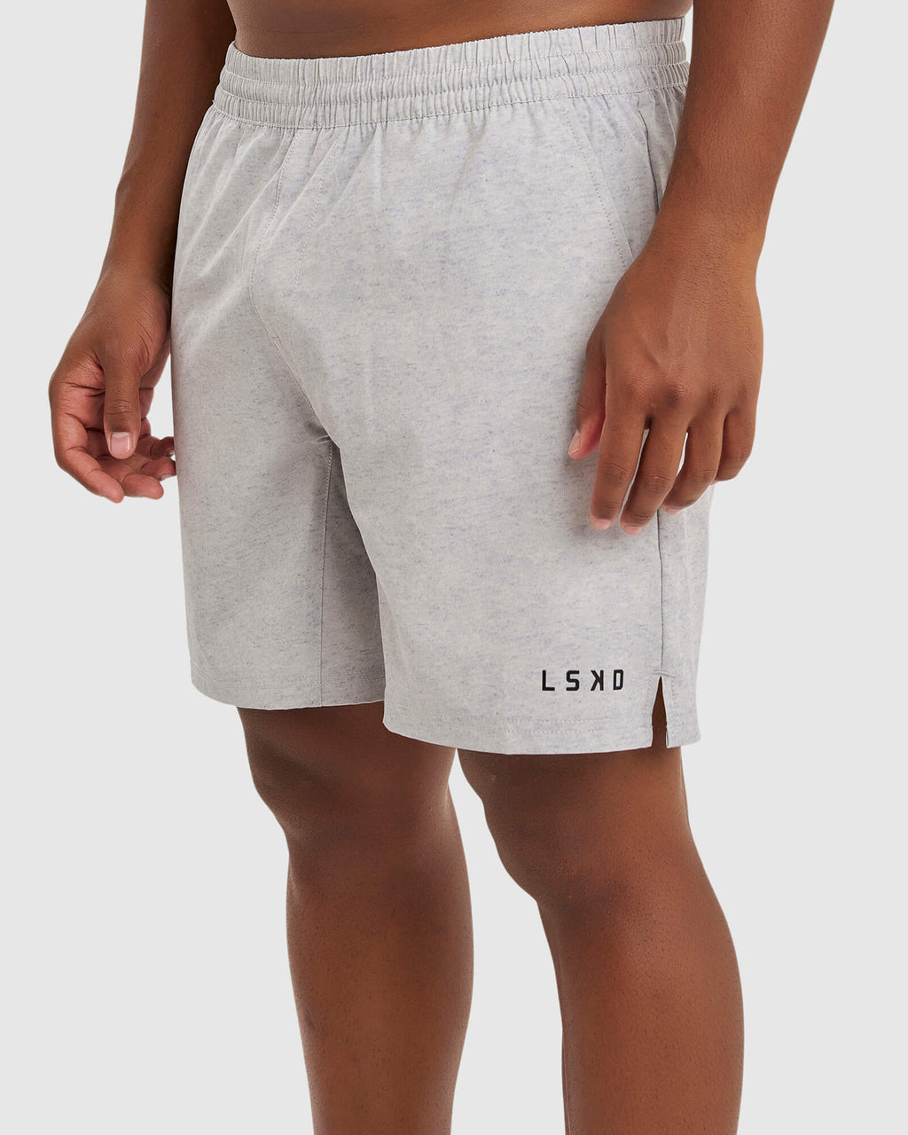 Model wearing Intensity 7" Performance Short - Lt Grey Marl