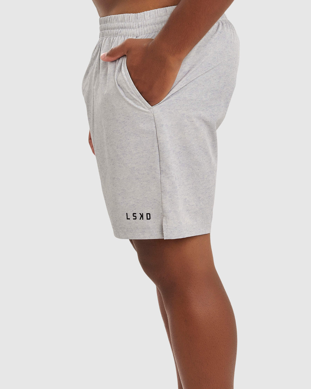 Model wearing Intensity 7" Performance Short - Lt Grey Marl