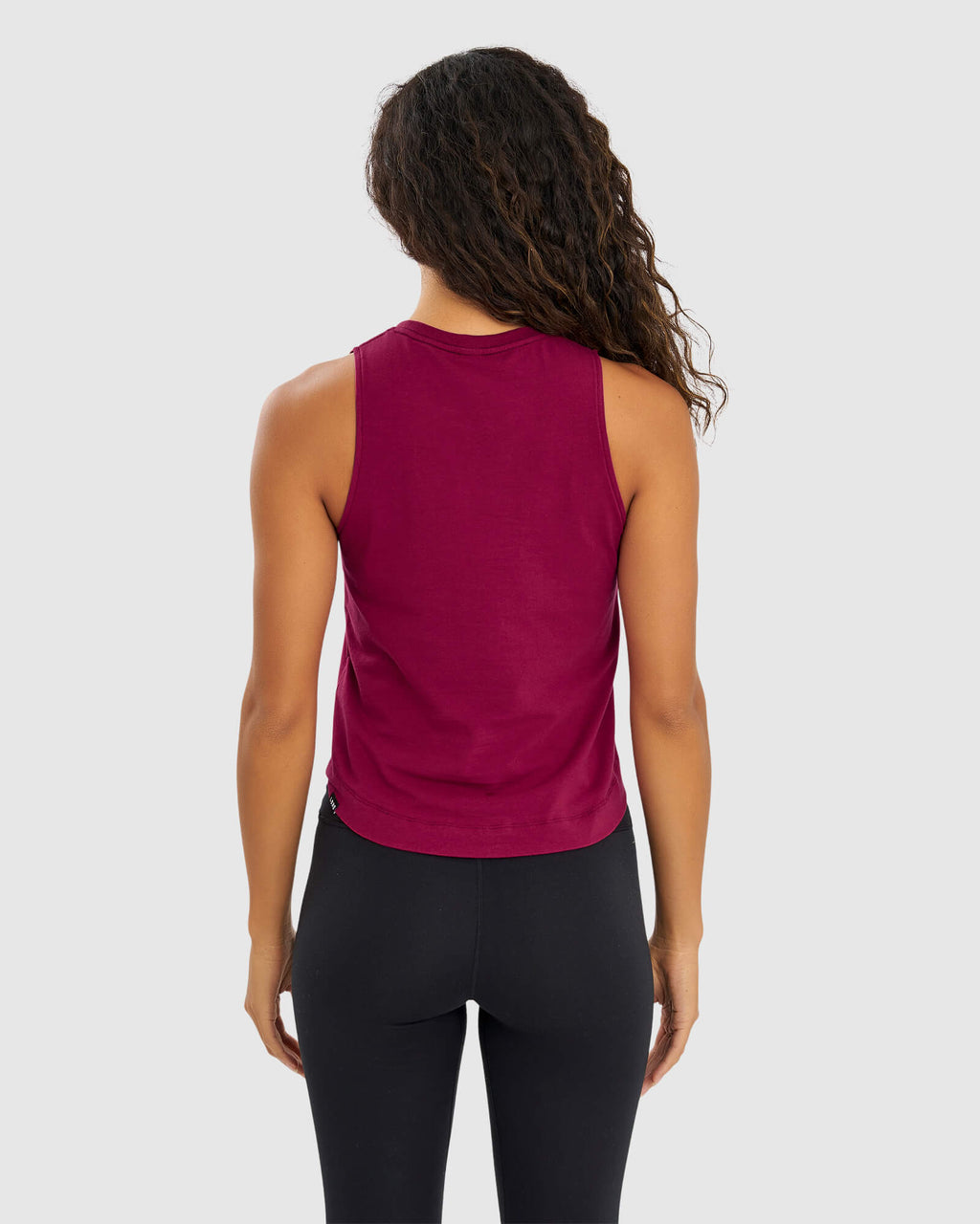 Model wearing Penalty Tank - Candy Apple