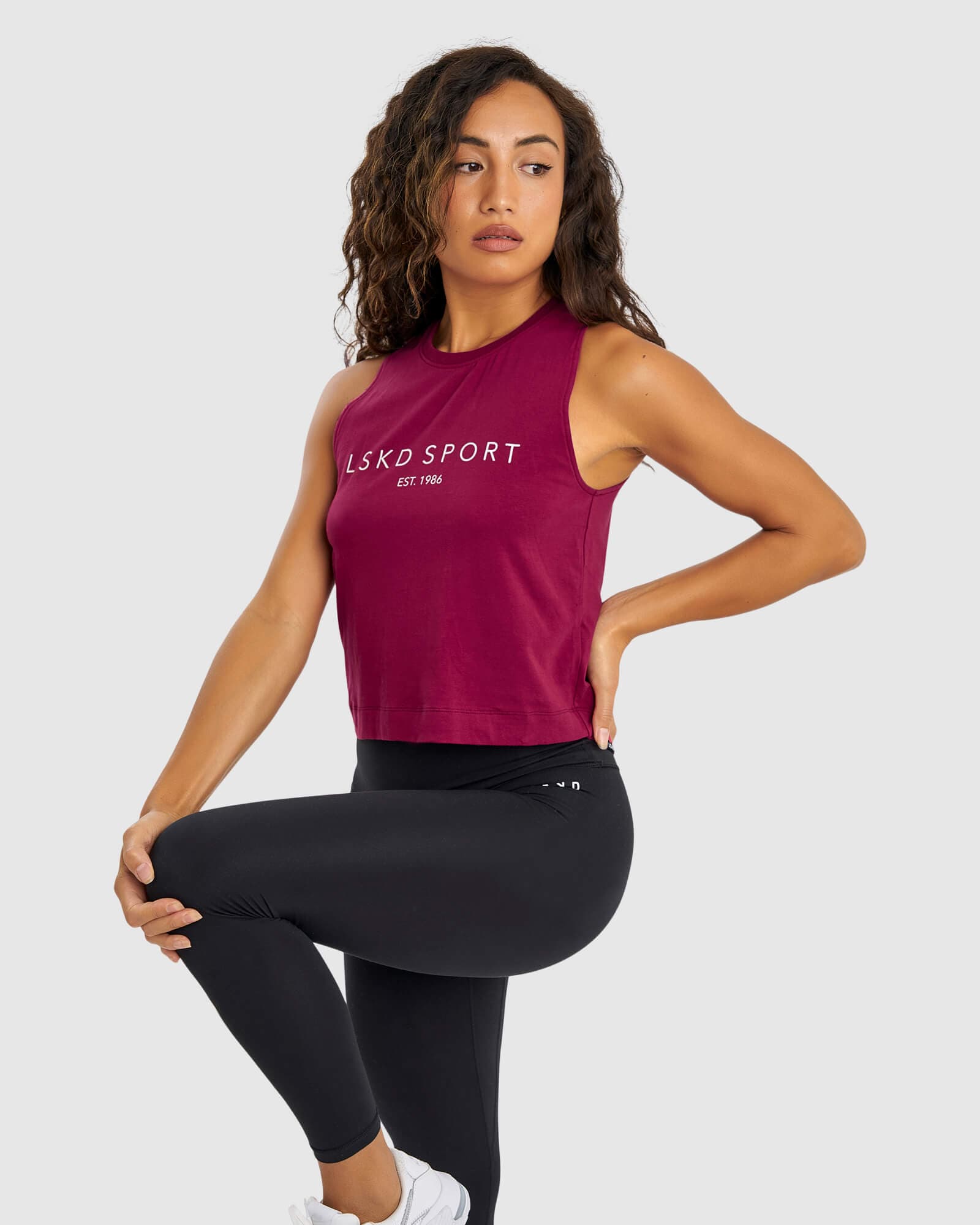 Model wearing Penalty Tank - Candy Apple