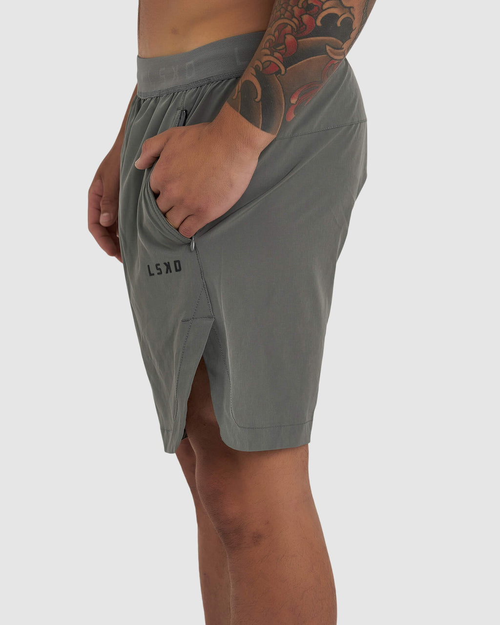 Model wearing Competition 8" Performance Short - Castlerock