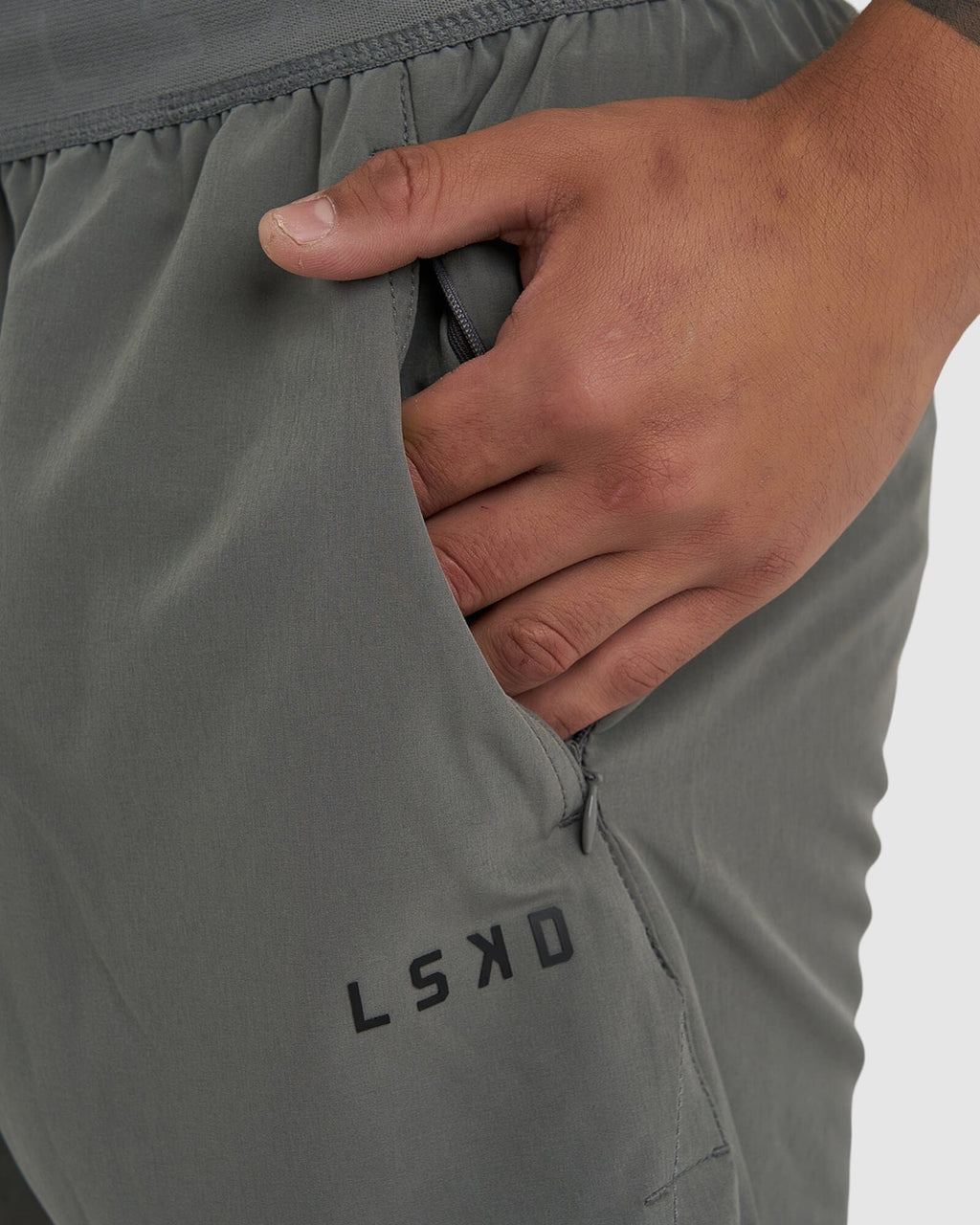 Model wearing Competition 8" Performance Short - Castlerock