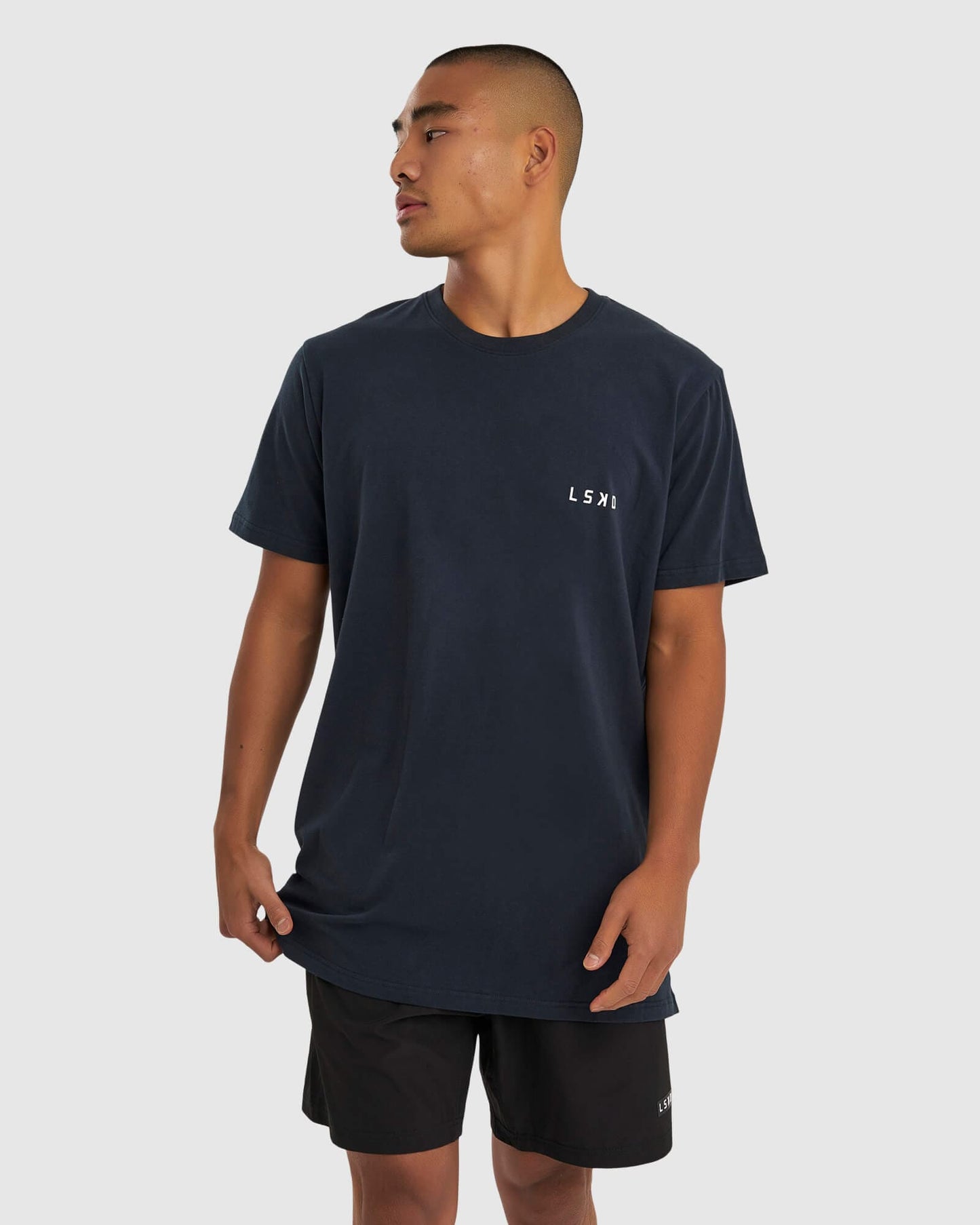 Model wearing Form Tee - Carbon