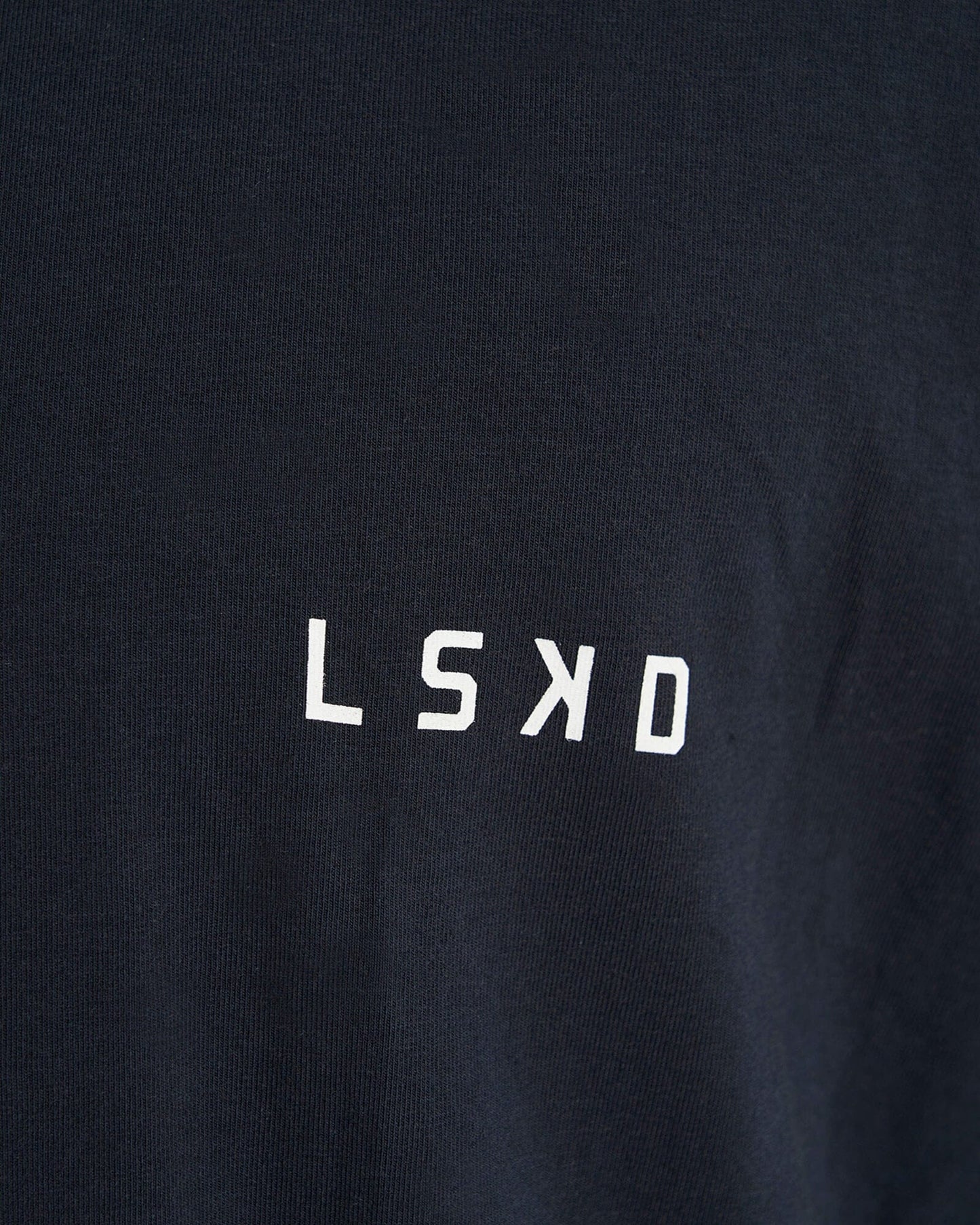 Model wearing Form Tee - Carbon