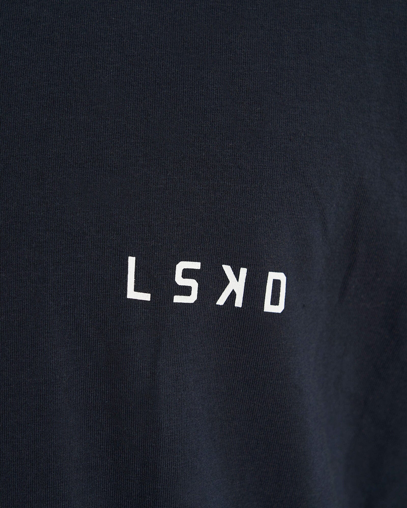 Model wearing Form Tee - Carbon