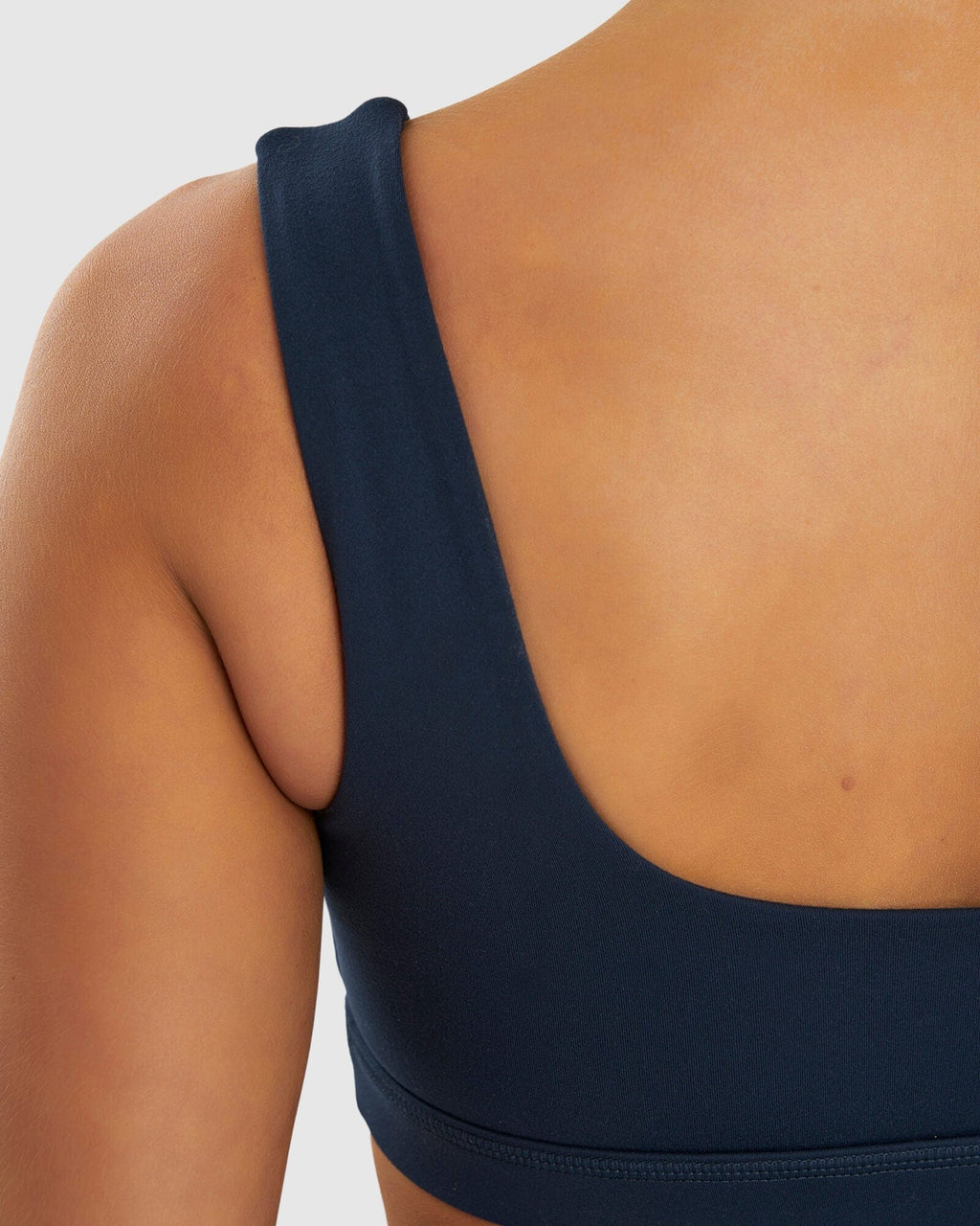 Model wearing Port Sports Bra - Carbon