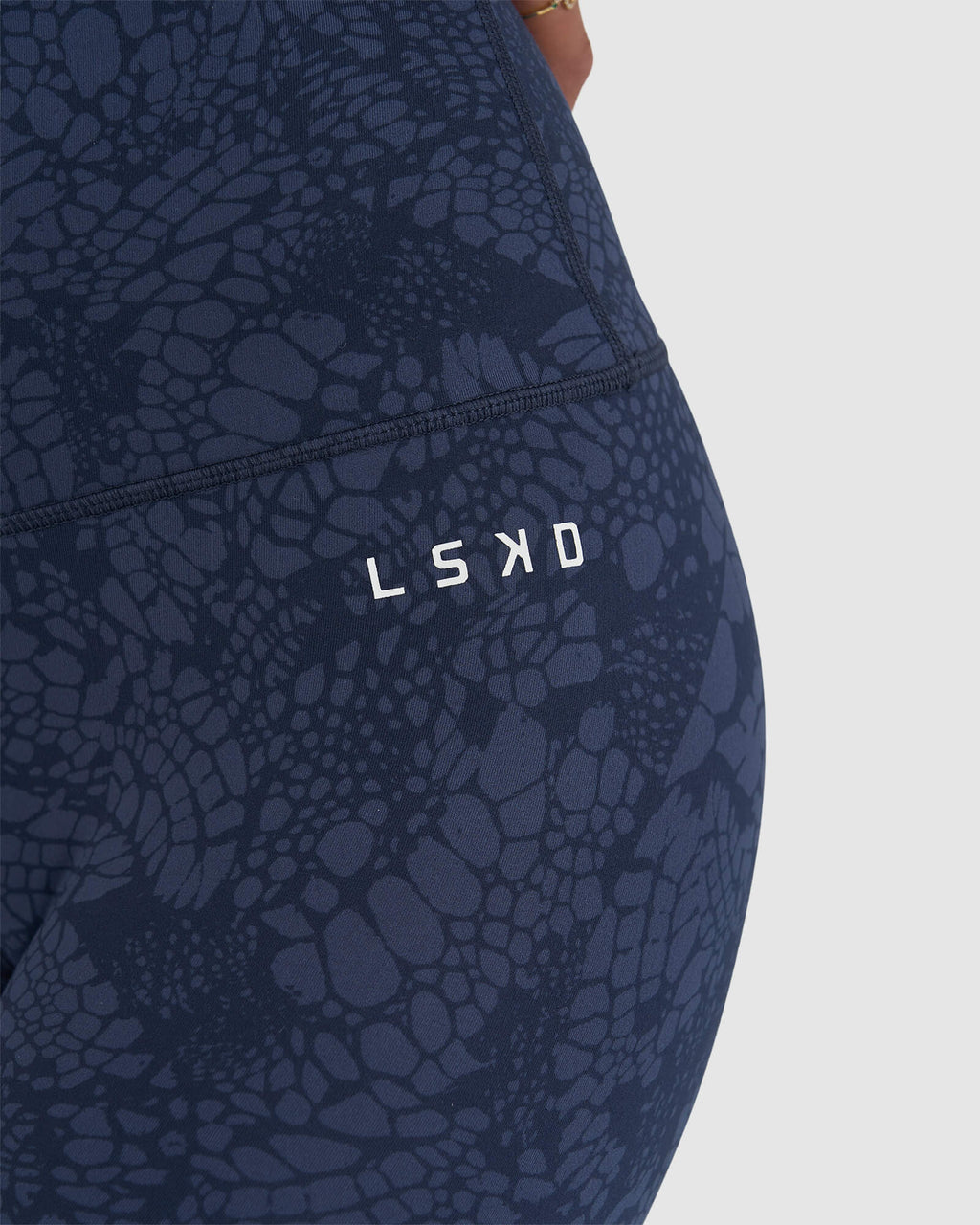 Model wearing Base X-Short Tight - Navy Mamba