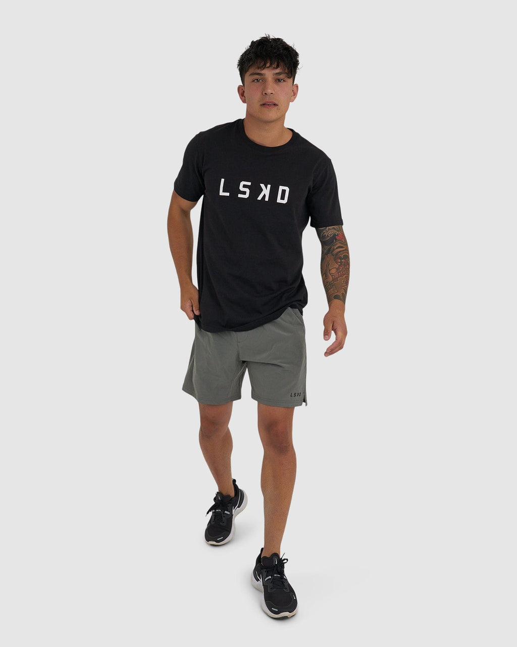 Model wearing Intensity 7" Performance Short - Boulder