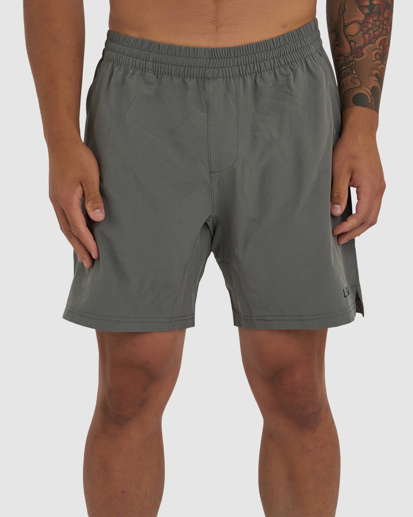 Model wearing Intensity 7" Performance Short - Boulder