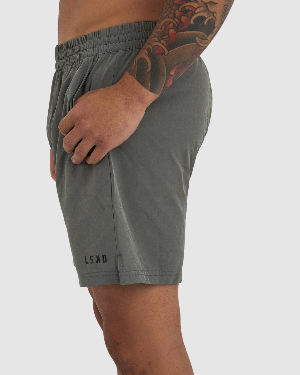 Model wearing Intensity 7" Performance Short - Boulder