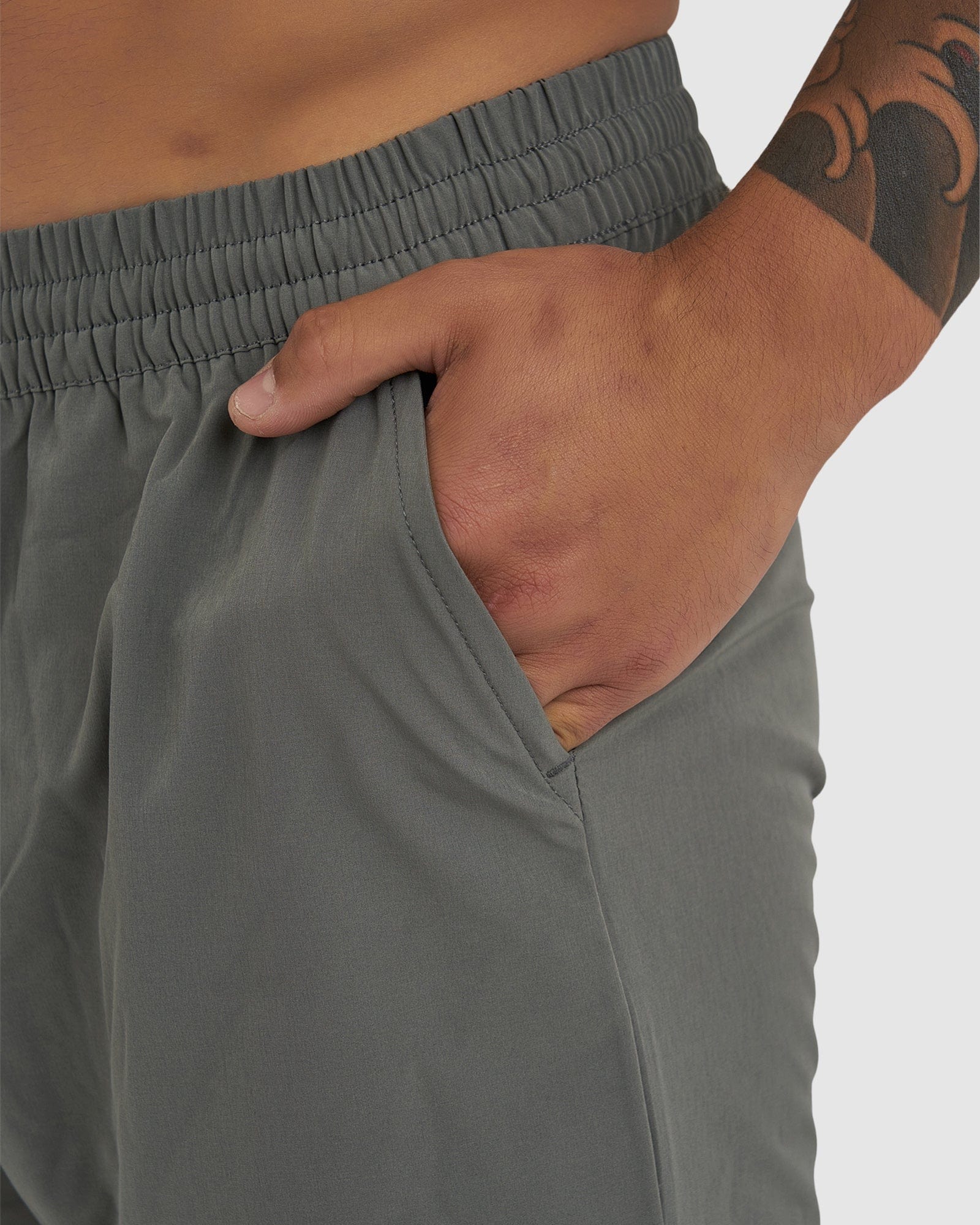 Model wearing Intensity 7" Performance Short - Boulder