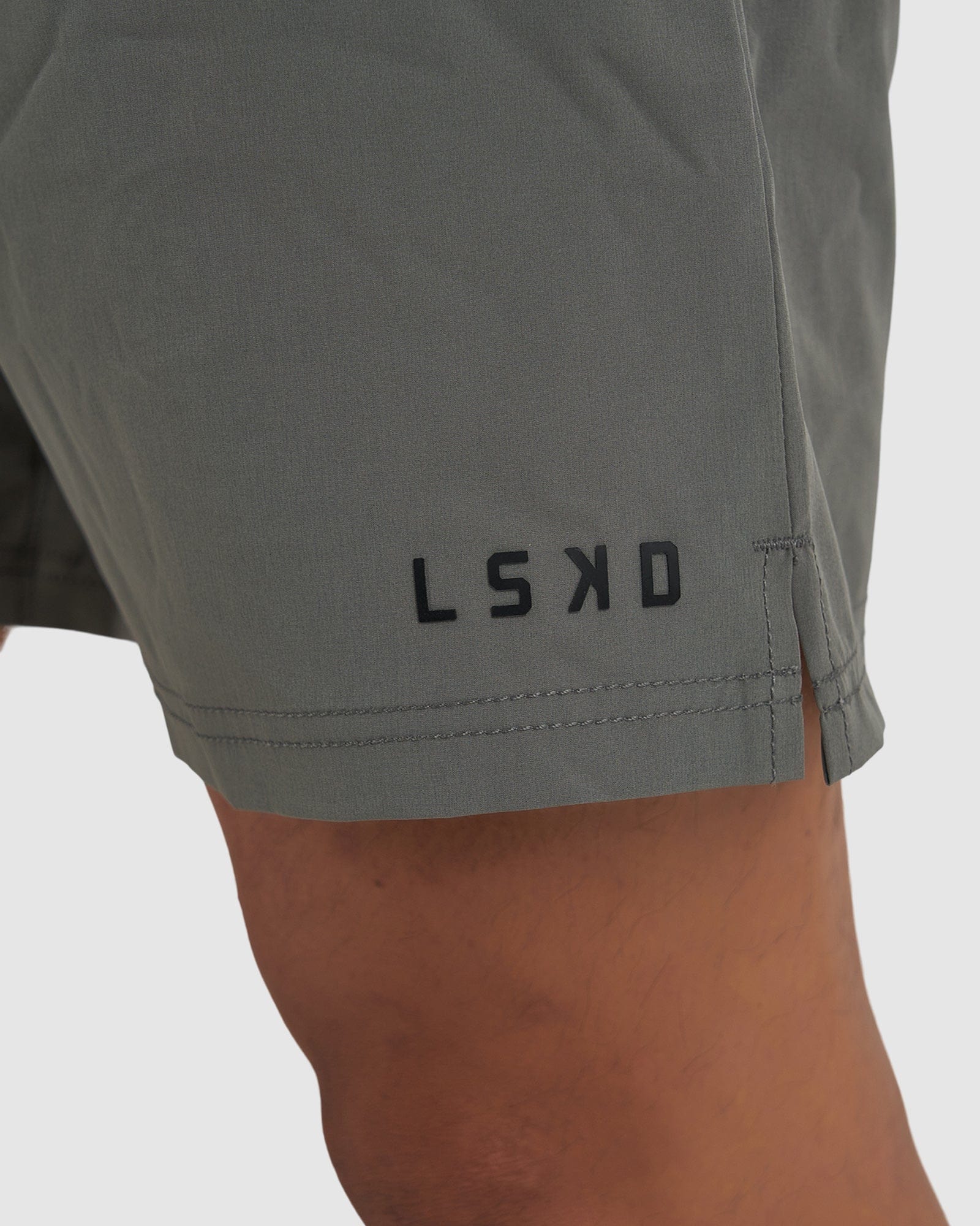 Model wearing Intensity 7" Performance Short - Boulder