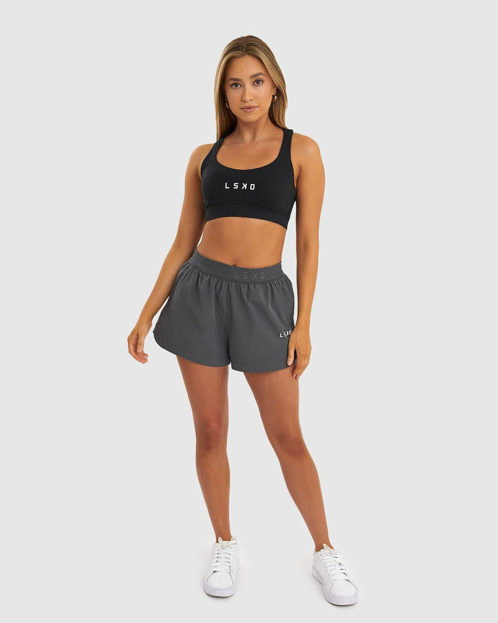 Model wearing Competition Performance Short - Iron