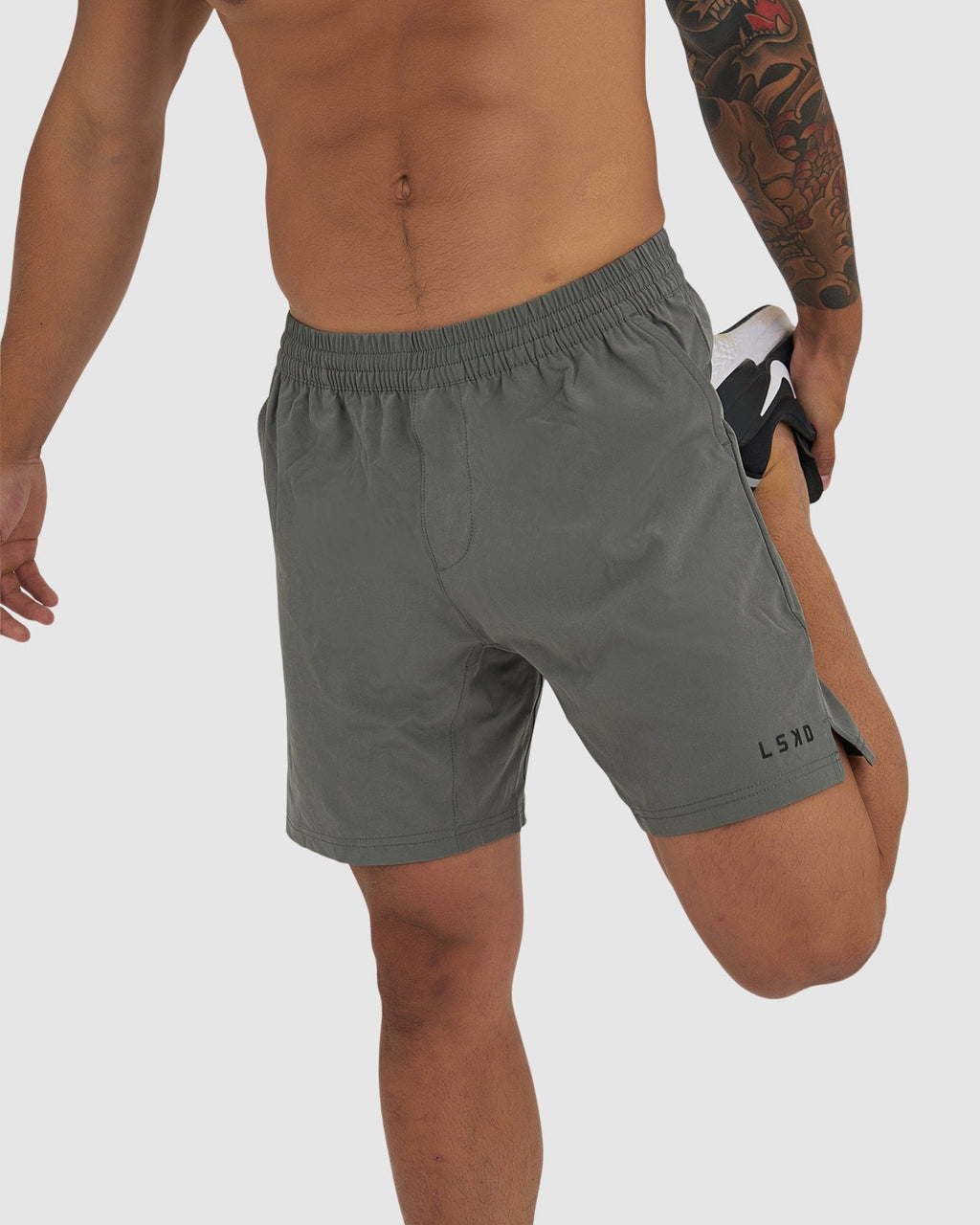 Model wearing Intensity 7" Performance Short - Boulder