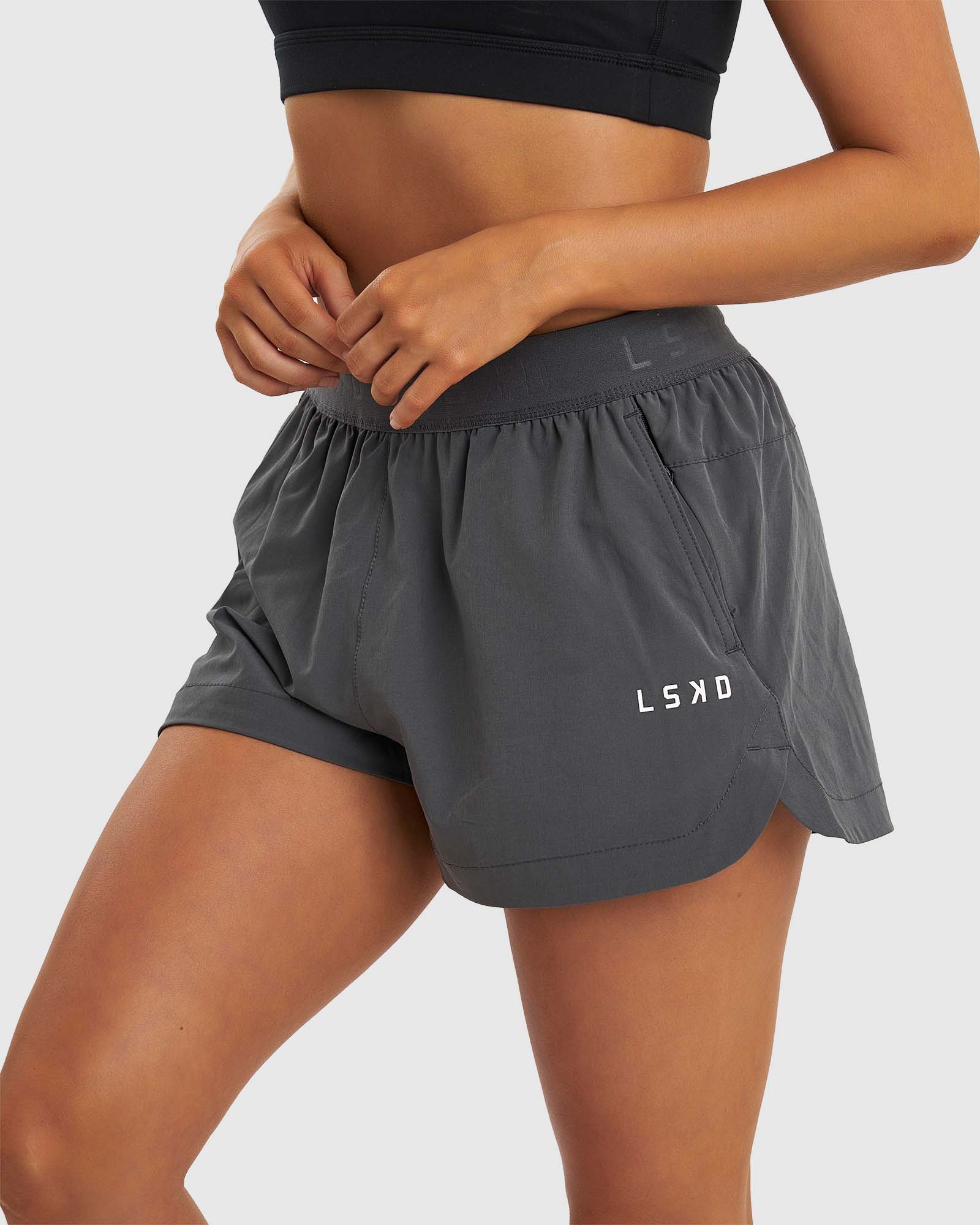 Model wearing Competition Performance Short - Iron