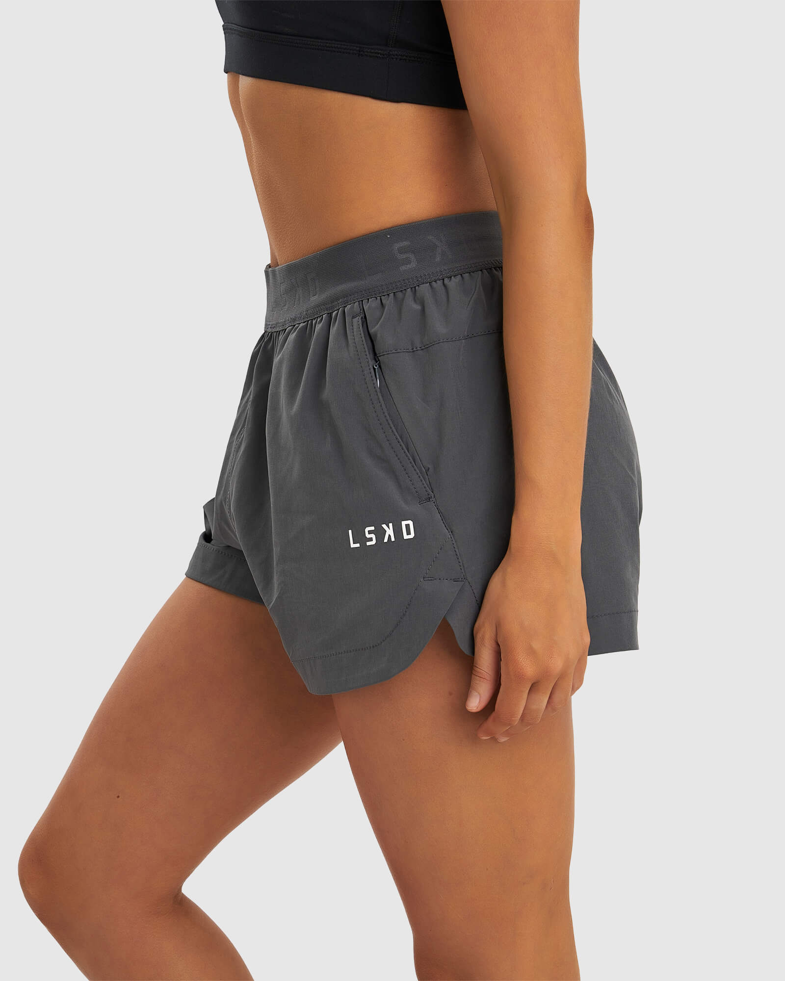 Model wearing Competition Performance Short - Iron