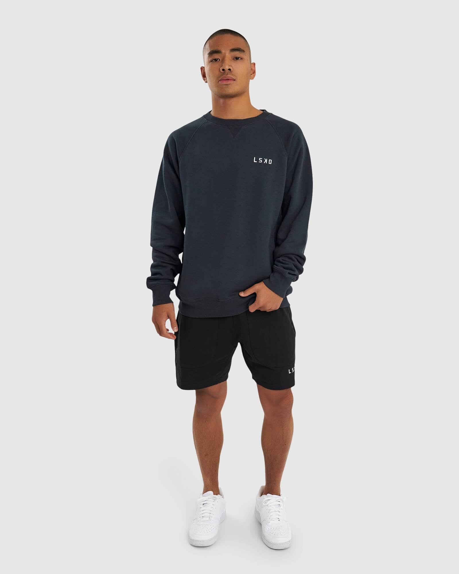 Model wearing Unisex Session Sweater - Carbon