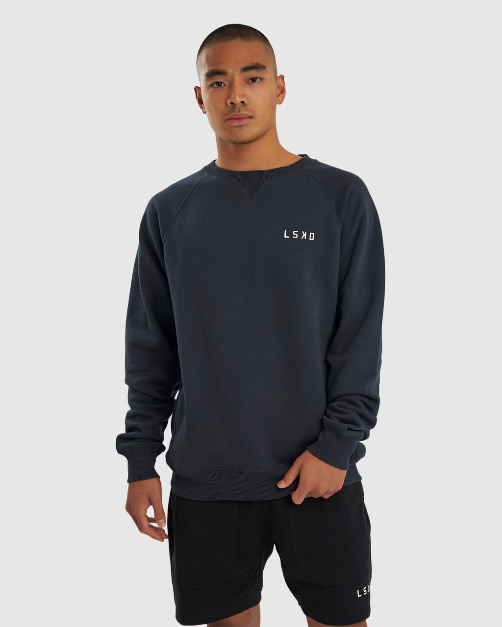 Model wearing Unisex Session Sweater - Carbon