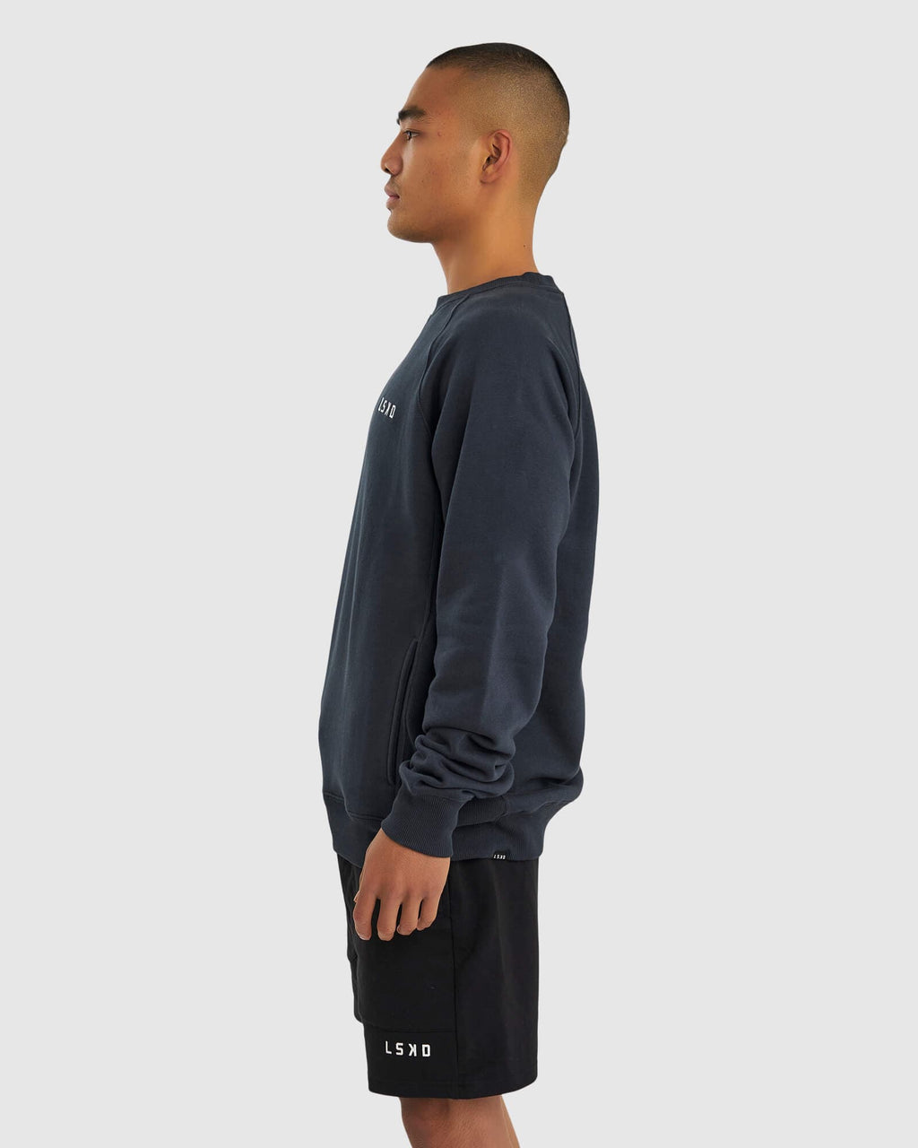 Model wearing Unisex Session Sweater - Carbon