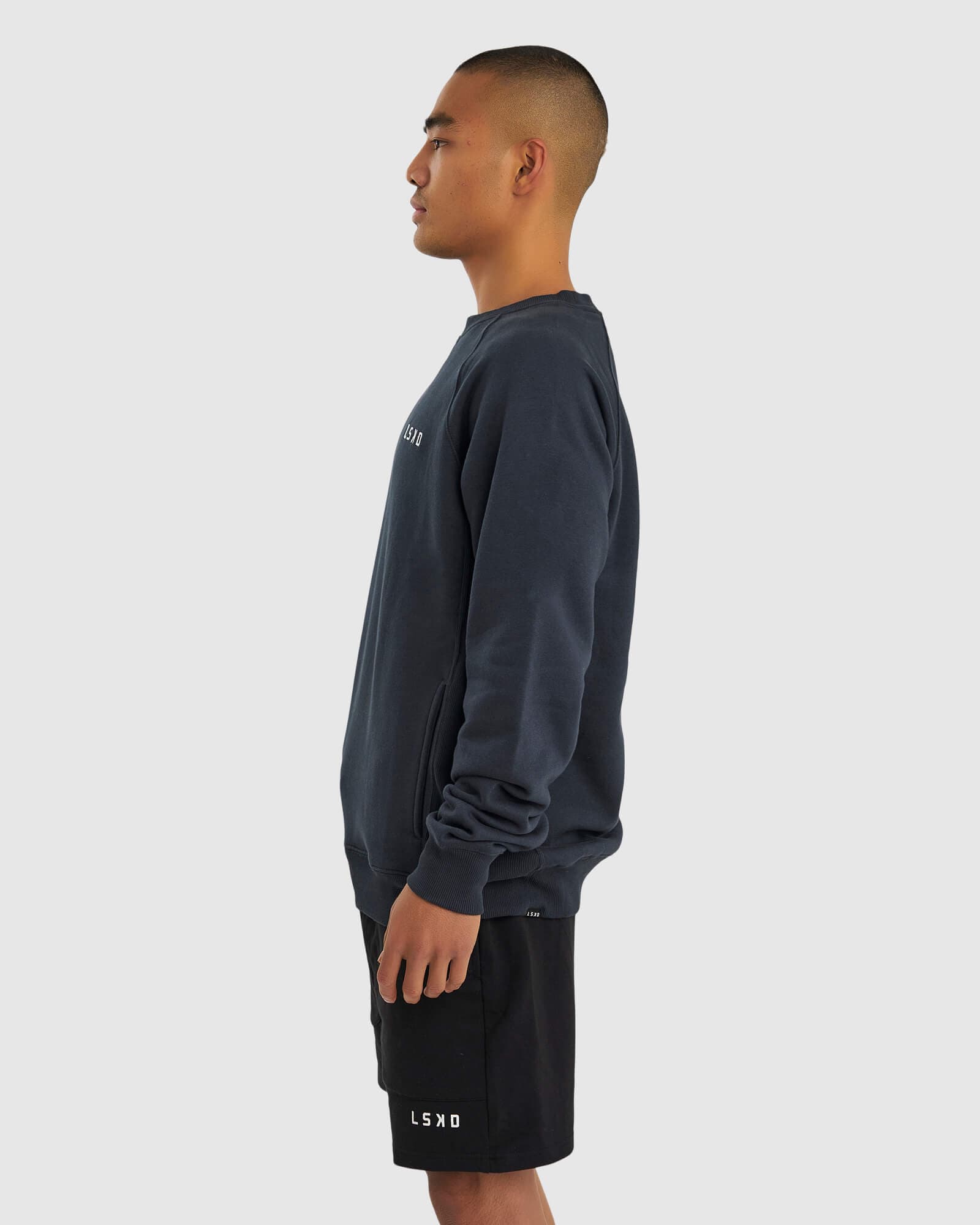 Model wearing Unisex Session Sweater - Carbon