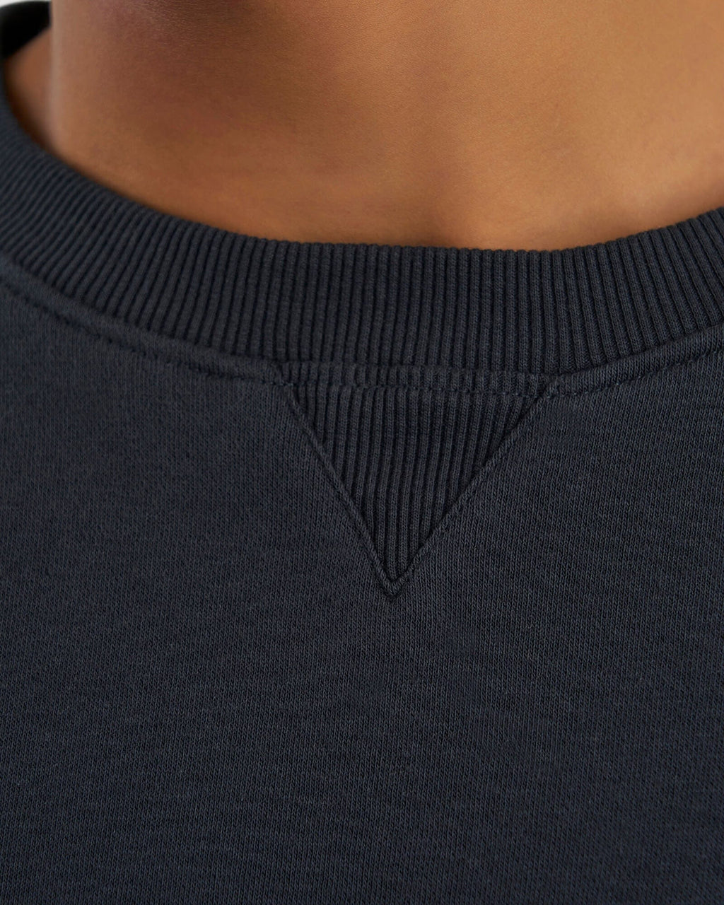 Model wearing Unisex Session Sweater - Carbon