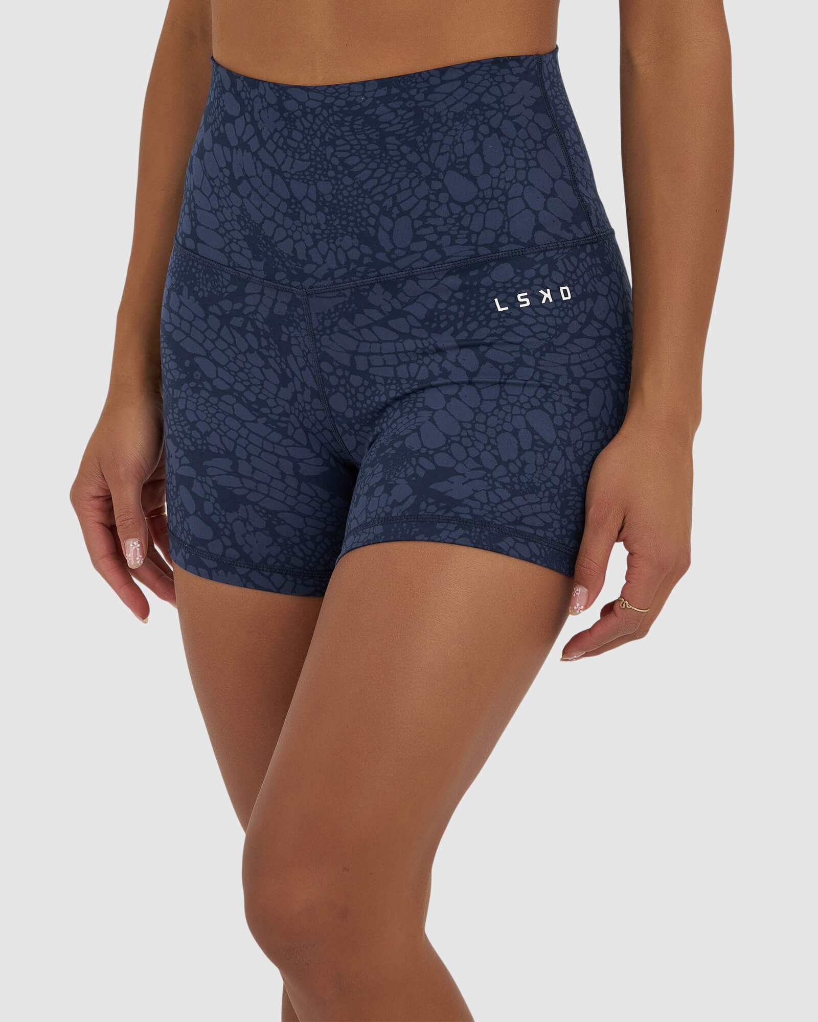 Model wearing Base X-Short Tight - Navy Mamba