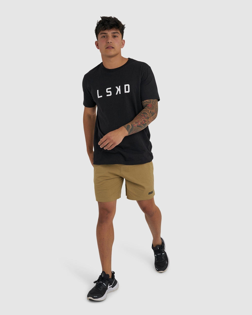 Model wearing Daily Short - Latte