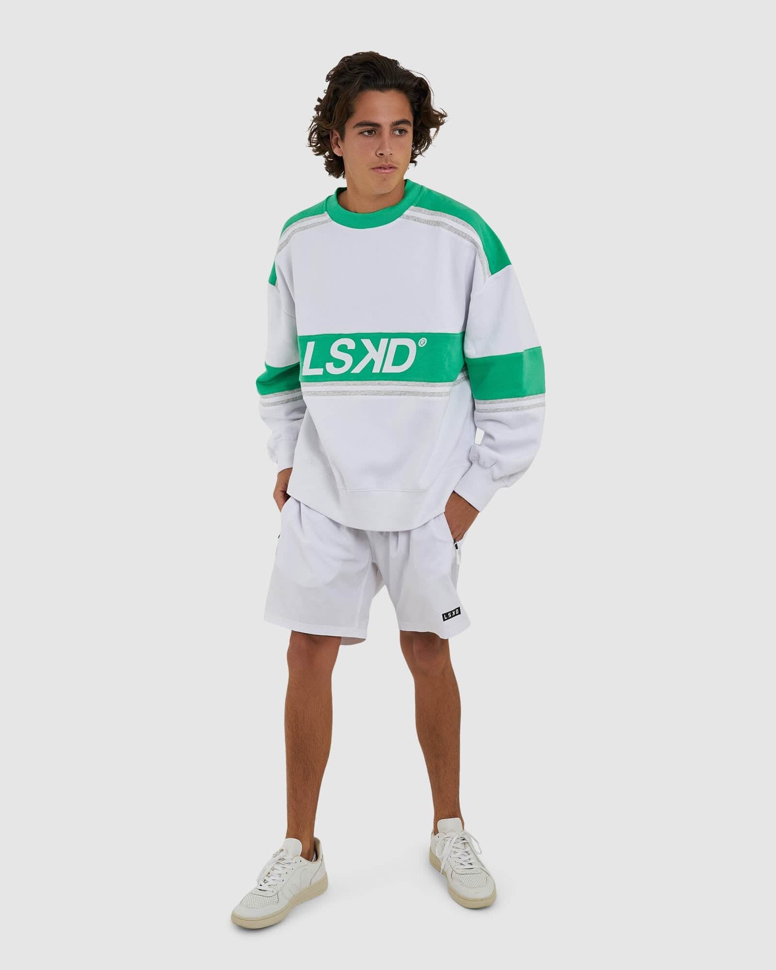 Model wearing Unisex A-Team Sweater Oversize - Apple Green