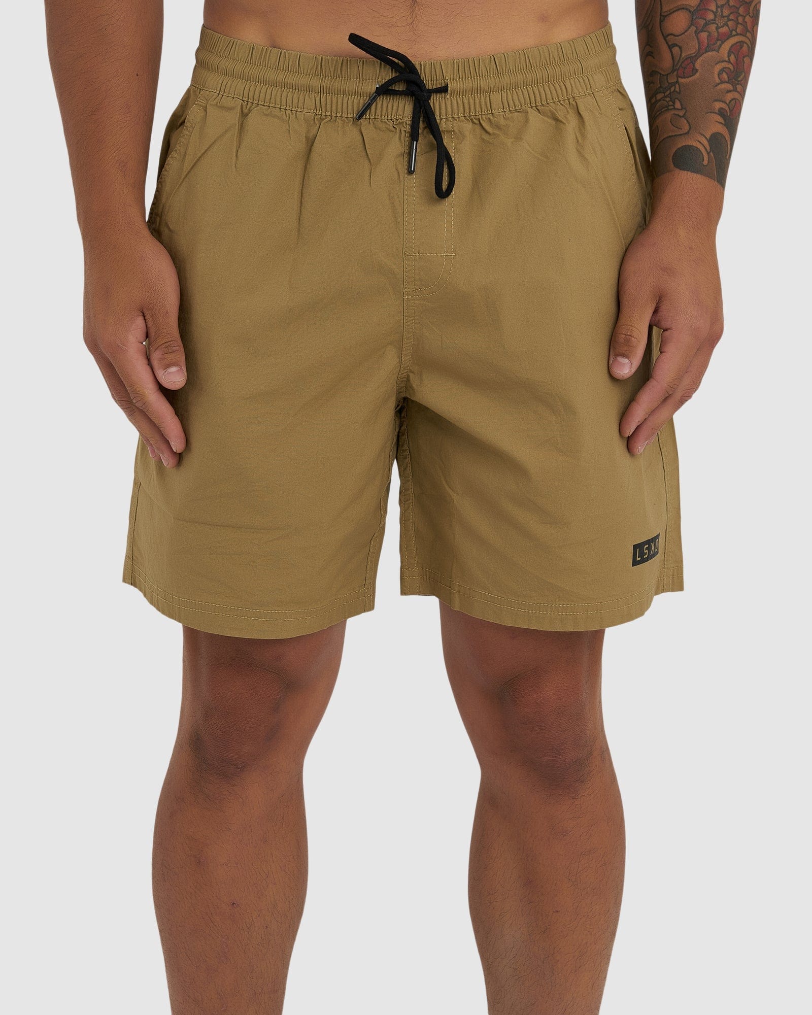 Model wearing Daily Short - Latte