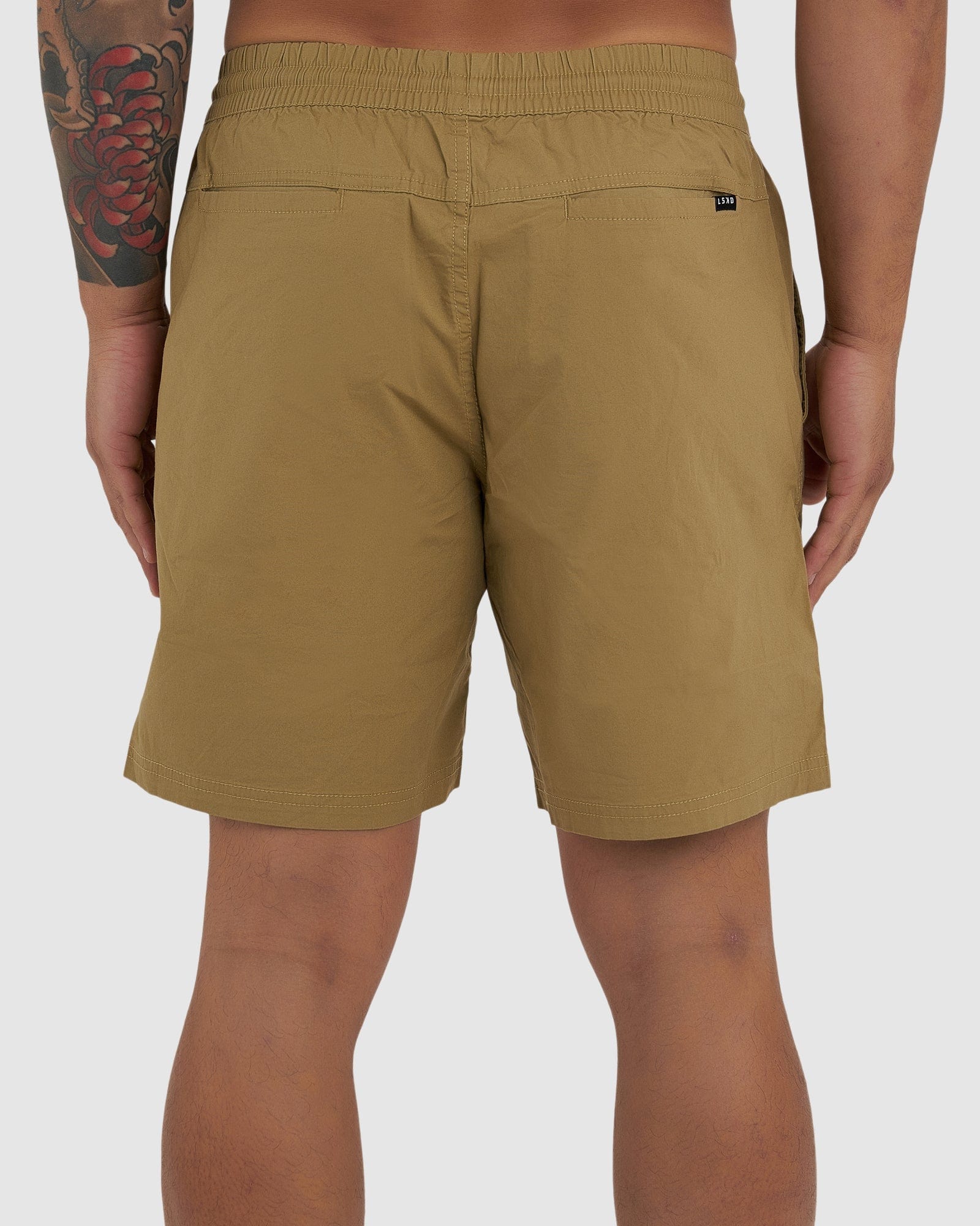 Model wearing Daily Short - Latte