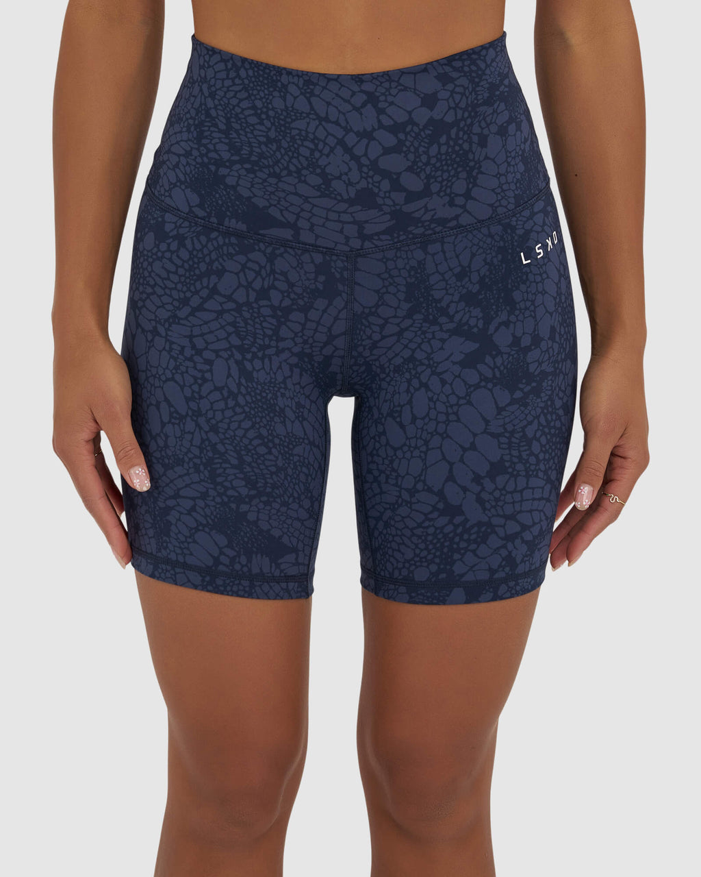 Model wearing Base Mid Short Tight - Navy Mamba