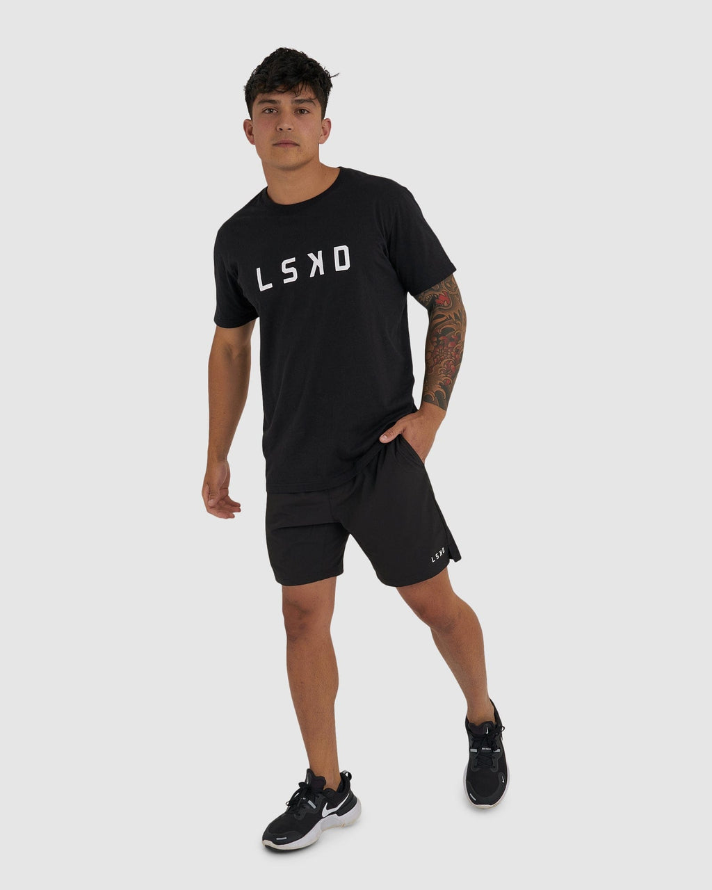 Model wearing Intensity 7" Performance Short - Black