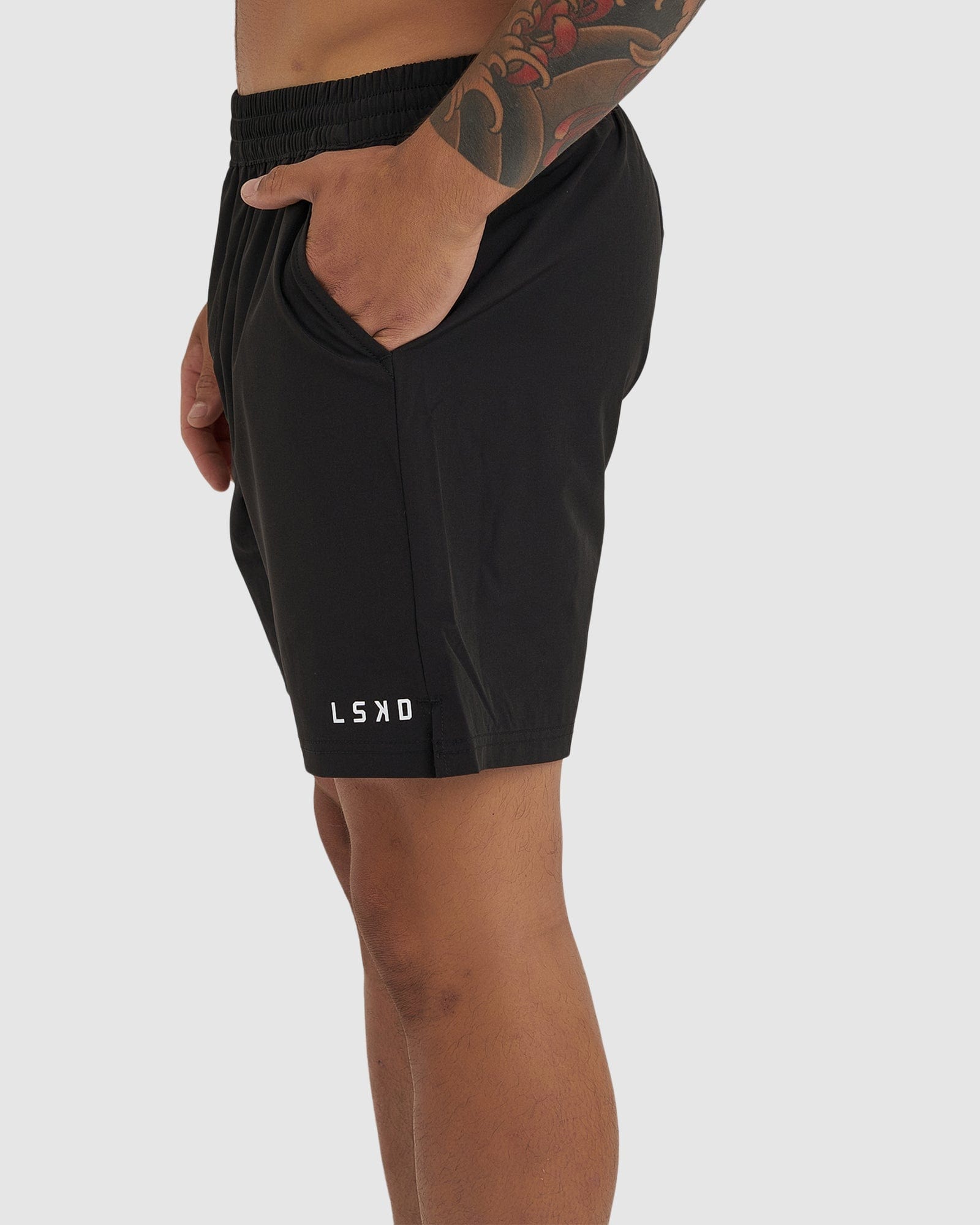 Model wearing Intensity 7" Performance Short - Black
