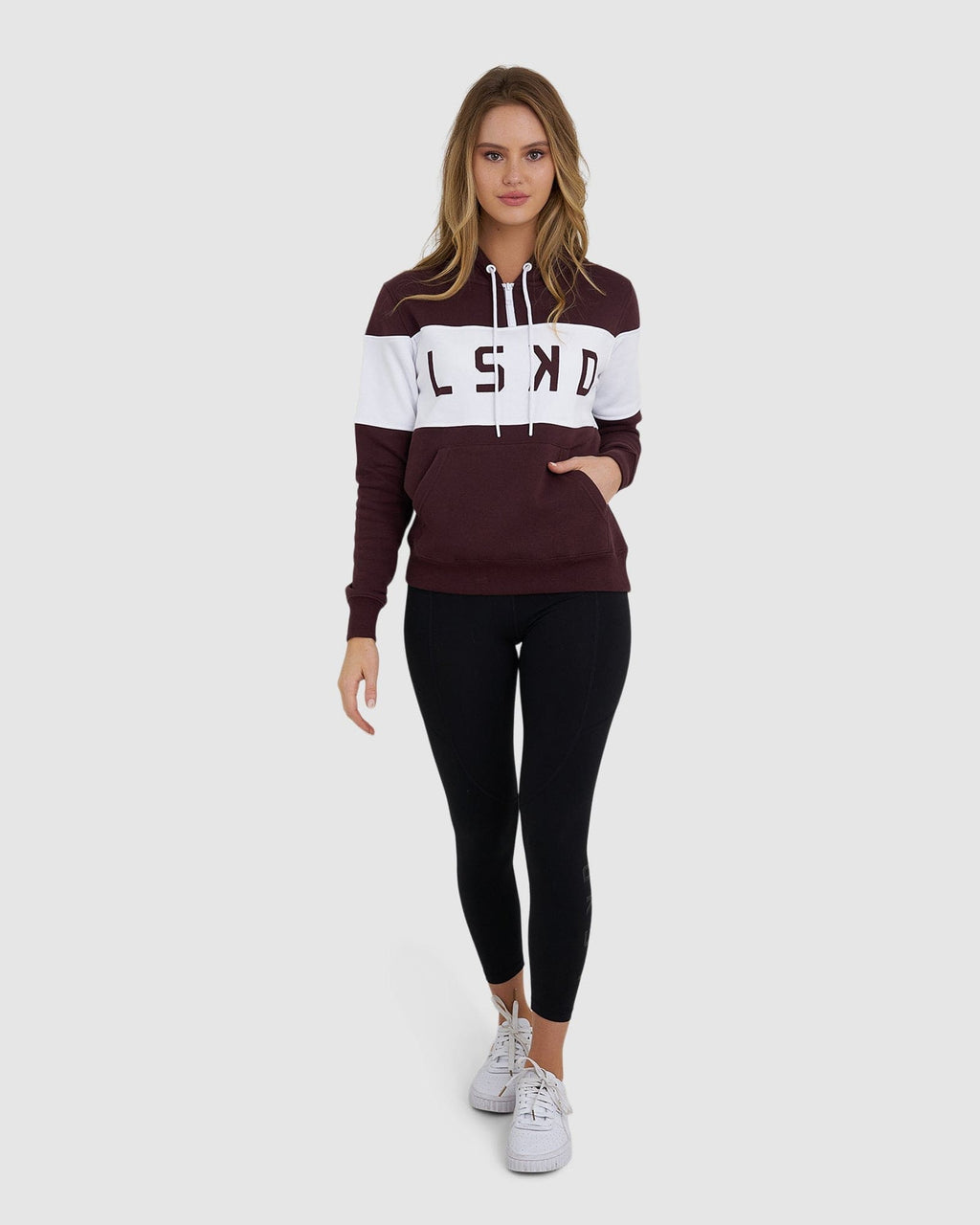 Model wearing Shape Hoodie - Fudge-White