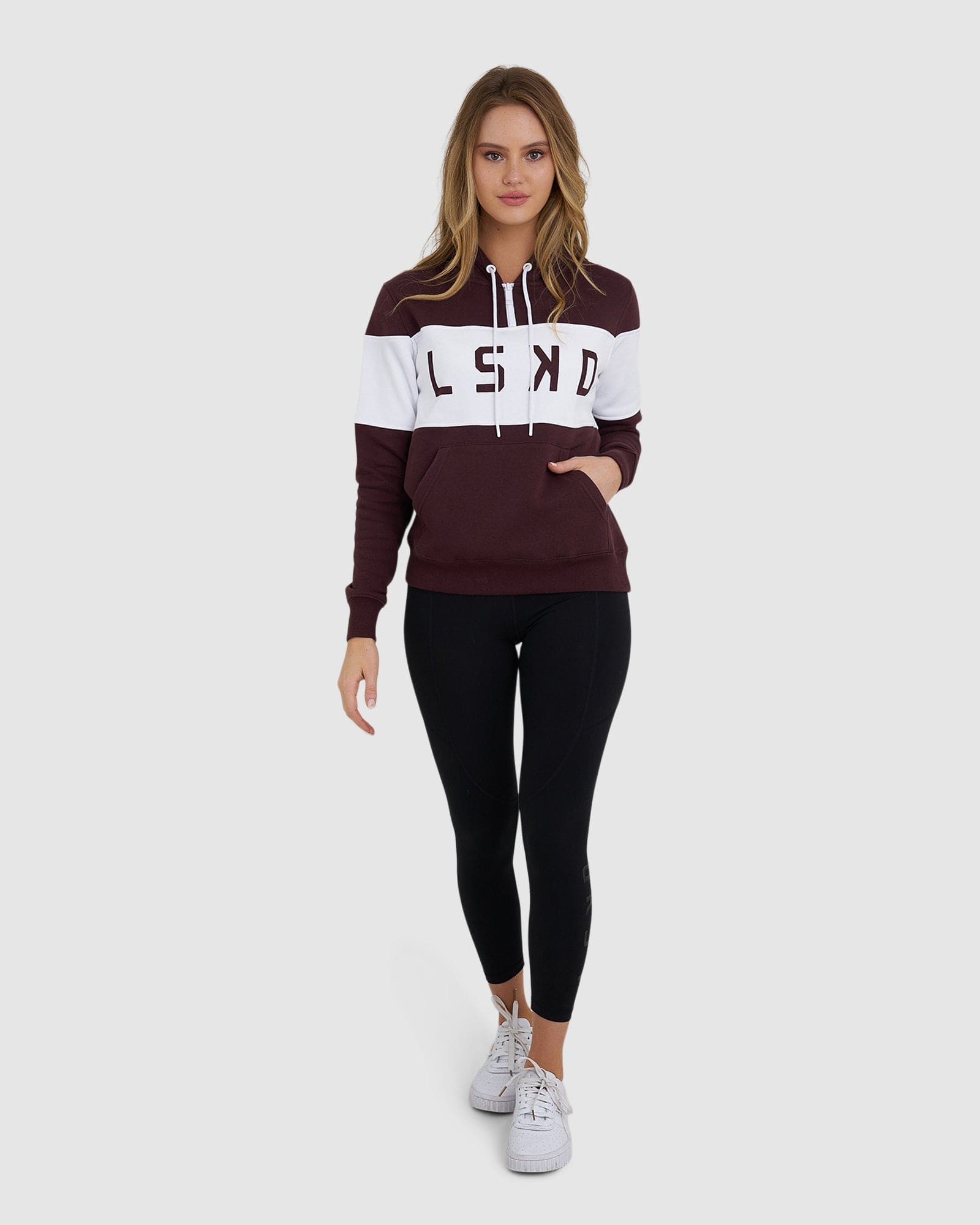 Model wearing Shape Hoodie - Fudge-White