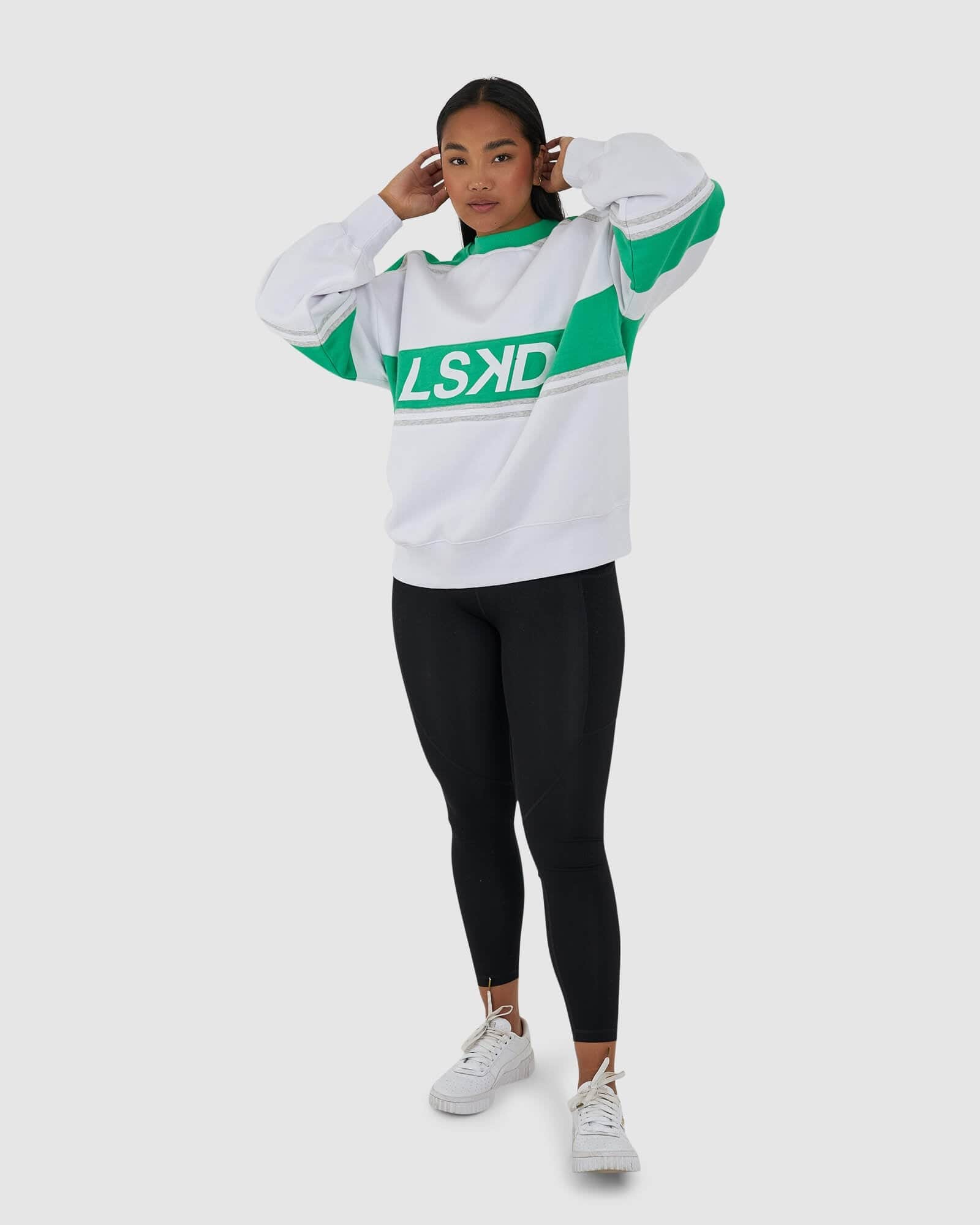 Model wearing Unisex A-Team Sweater Oversize - Apple Green