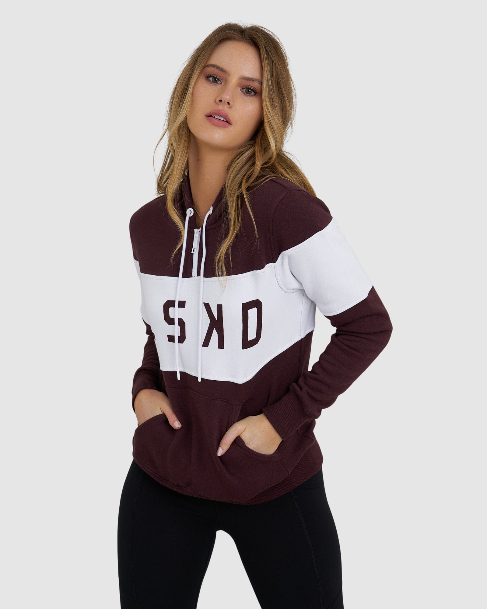 Model wearing Shape Hoodie - Fudge-White