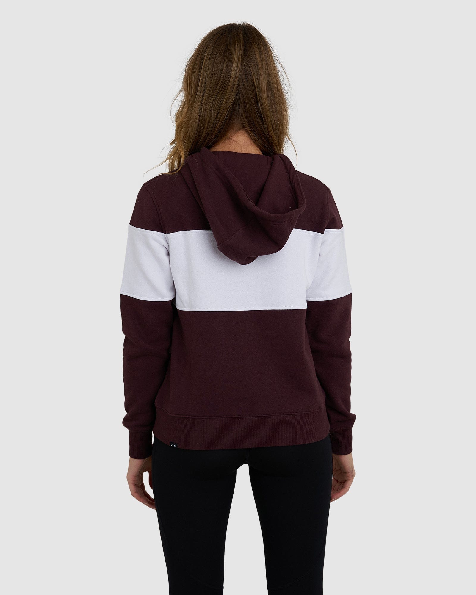 Model wearing Shape Hoodie - Fudge-White