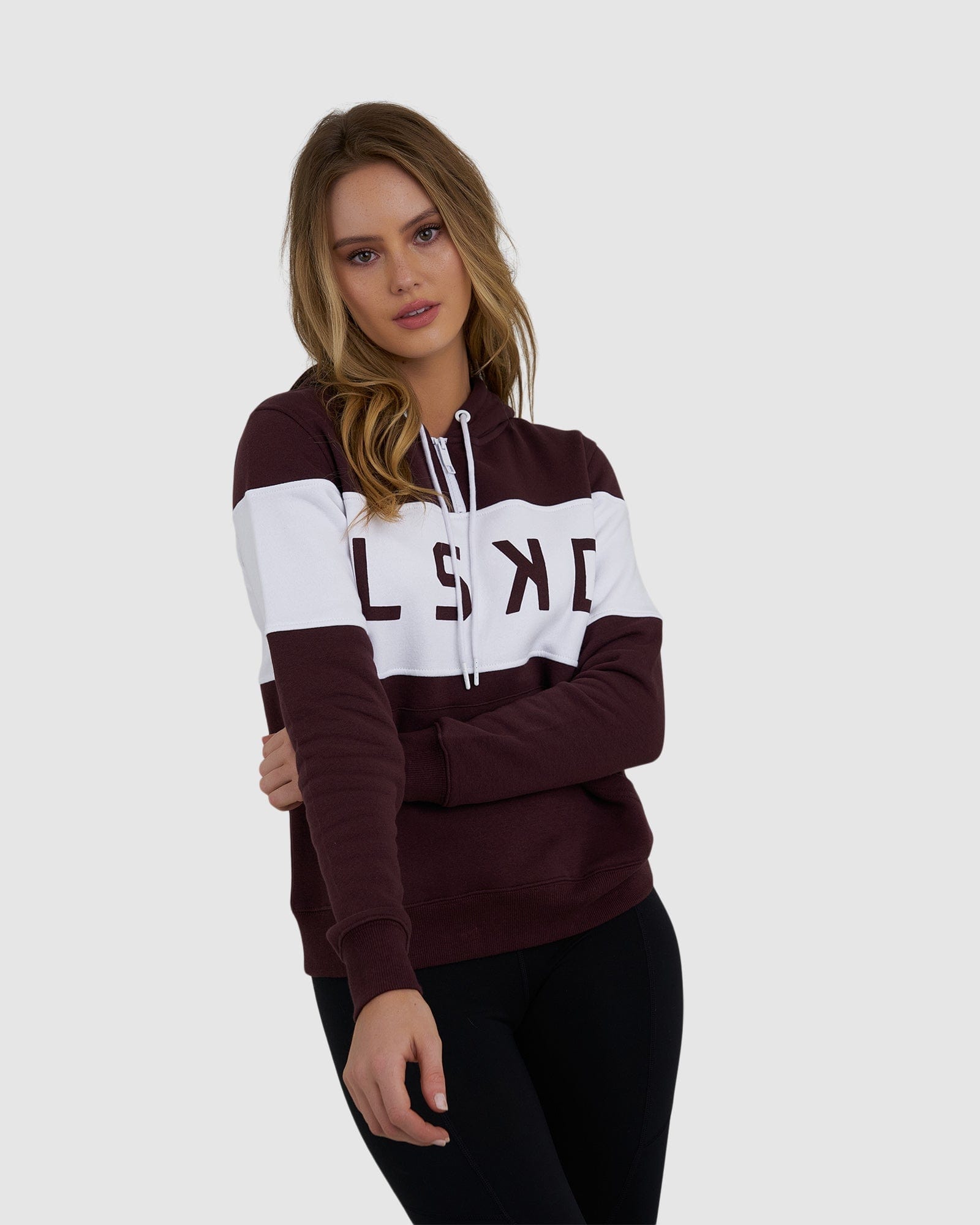 Model wearing Shape Hoodie - Fudge-White