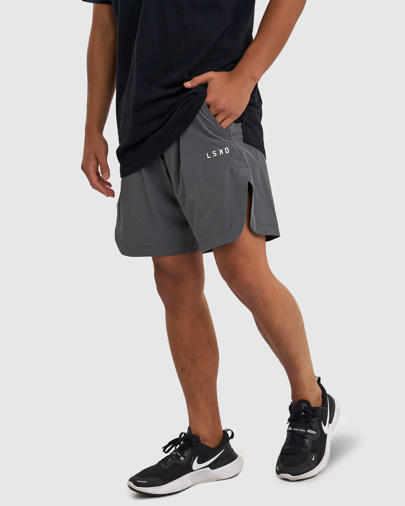 Model wearing Competition 8" Performance Short - Iron