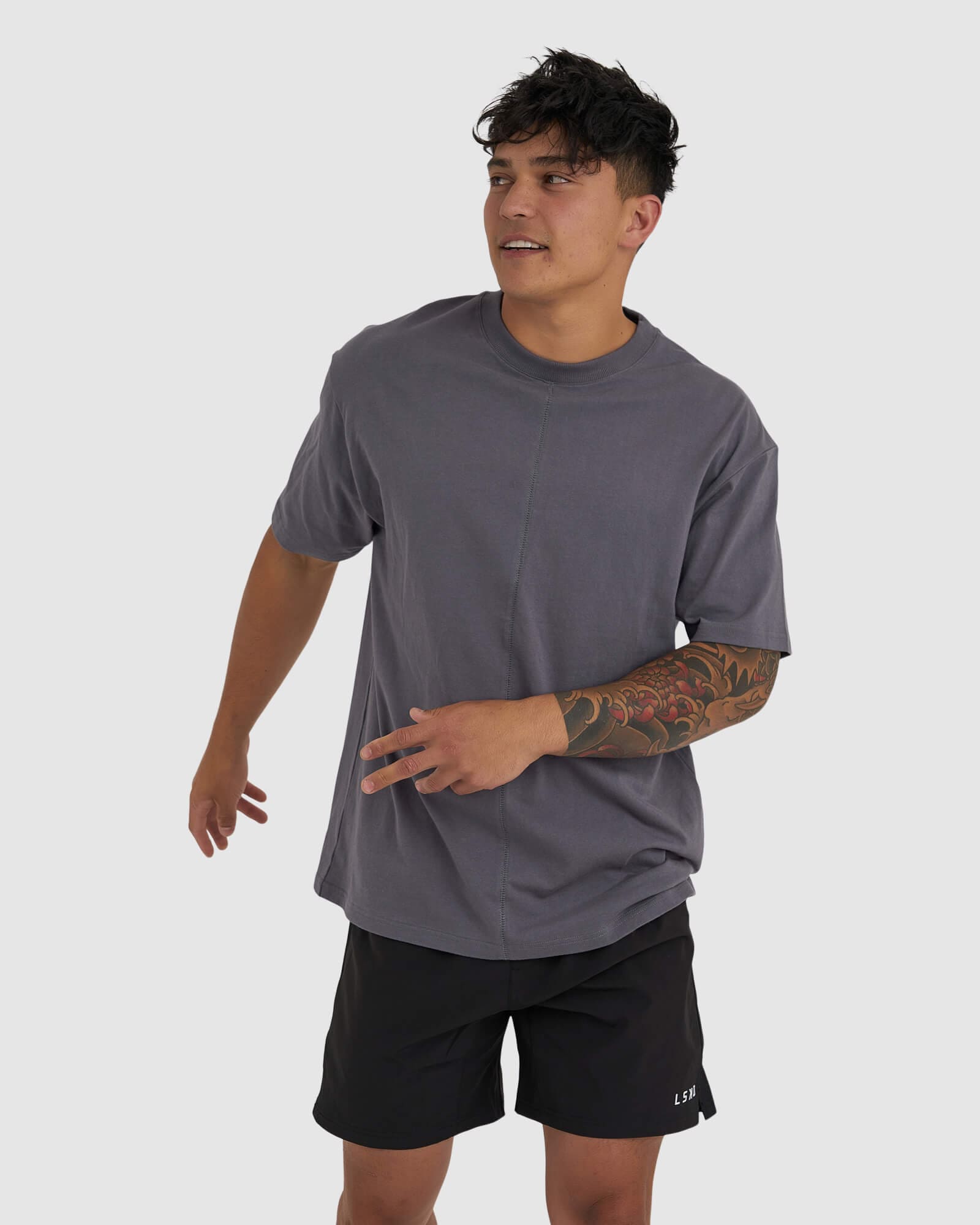 Model wearing Heavy Hitter Heavyweight Tee Oversize - Iron