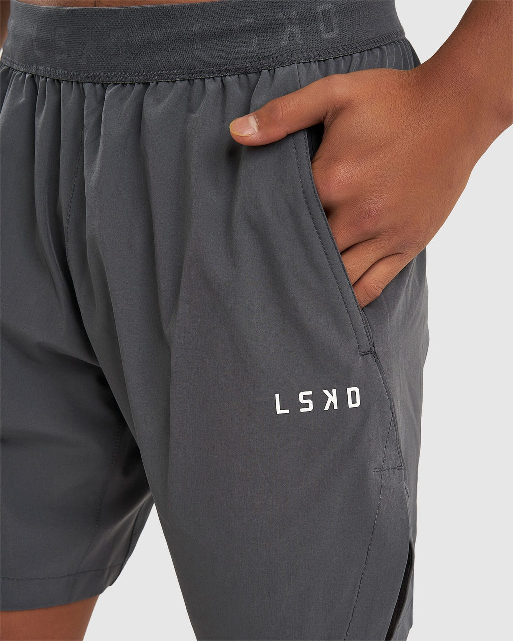 Model wearing Competition 8" Performance Short - Iron