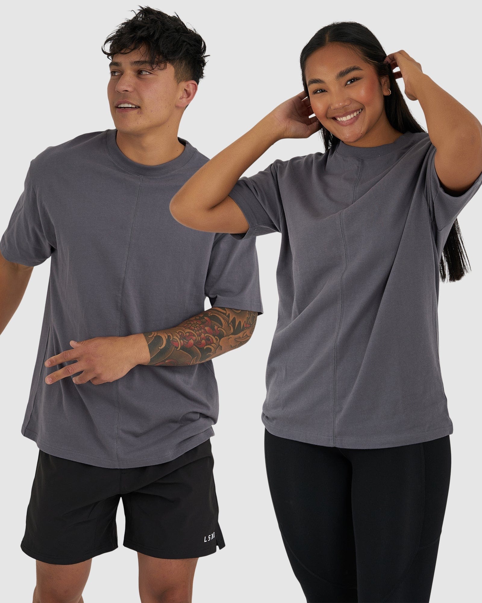 Model wearing Unisex Heavy Hitter Heavyweight Tee Oversize - Iron